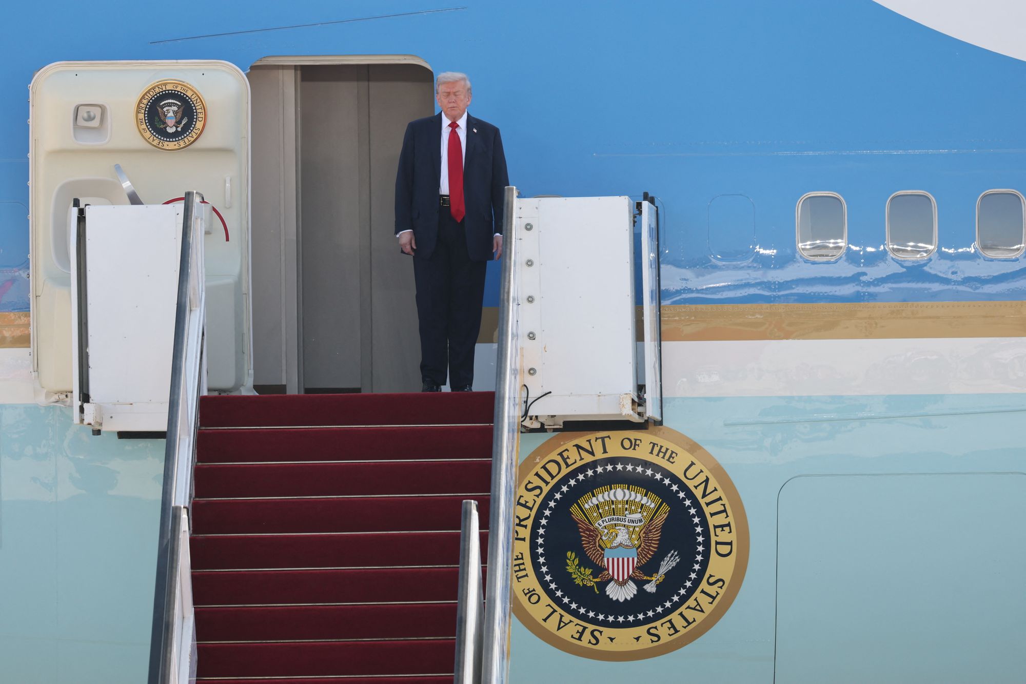 The shorter, alternative entrance to the aircraft extends into the belly of Air Force One, instead of the 18-foot staircase that attaches to the plane’s upper door – which is traditionally used by the Commander-in-Chief