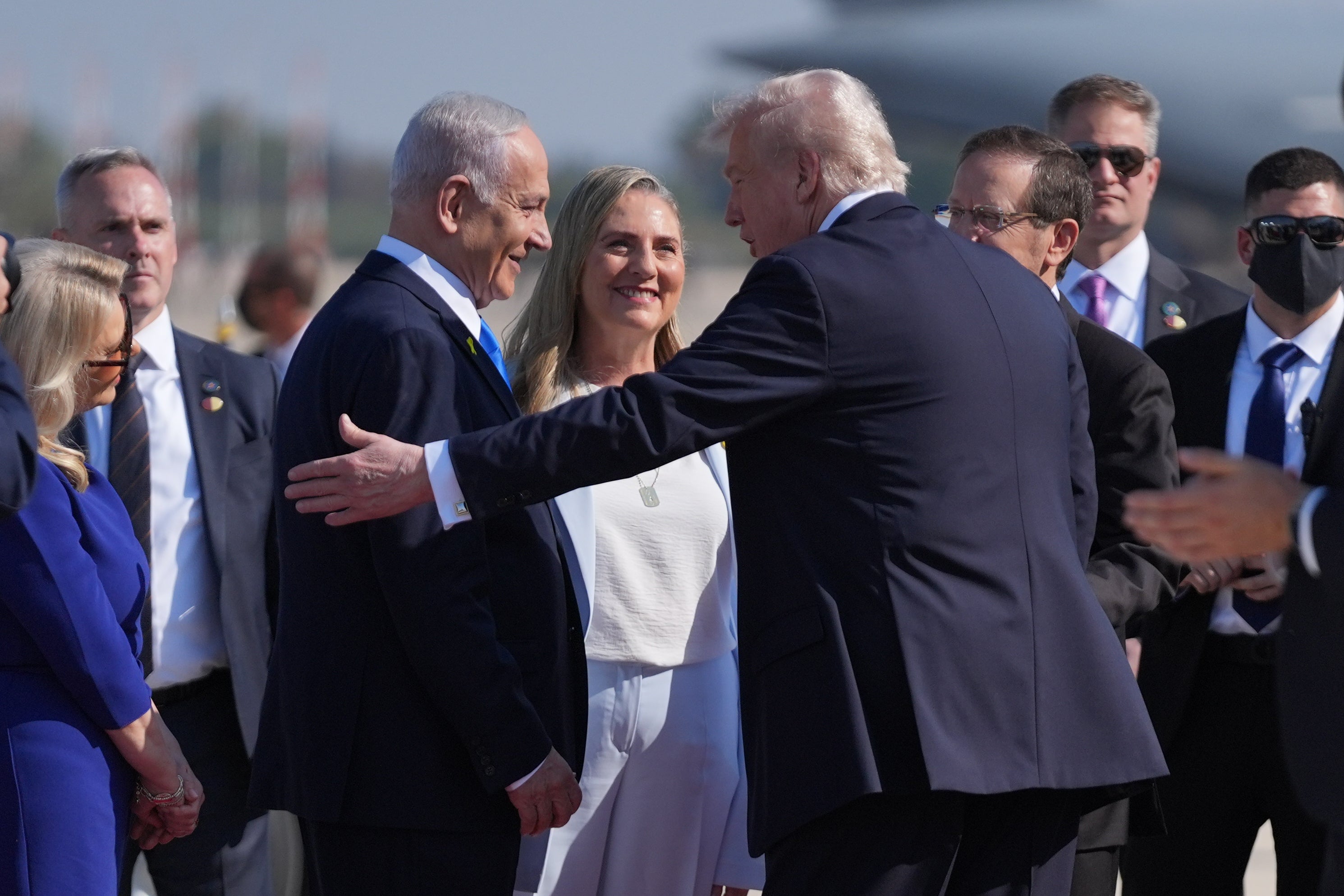 Donald Trump greets Israeli prime minister Benjamin Netanyahu shortly after landing