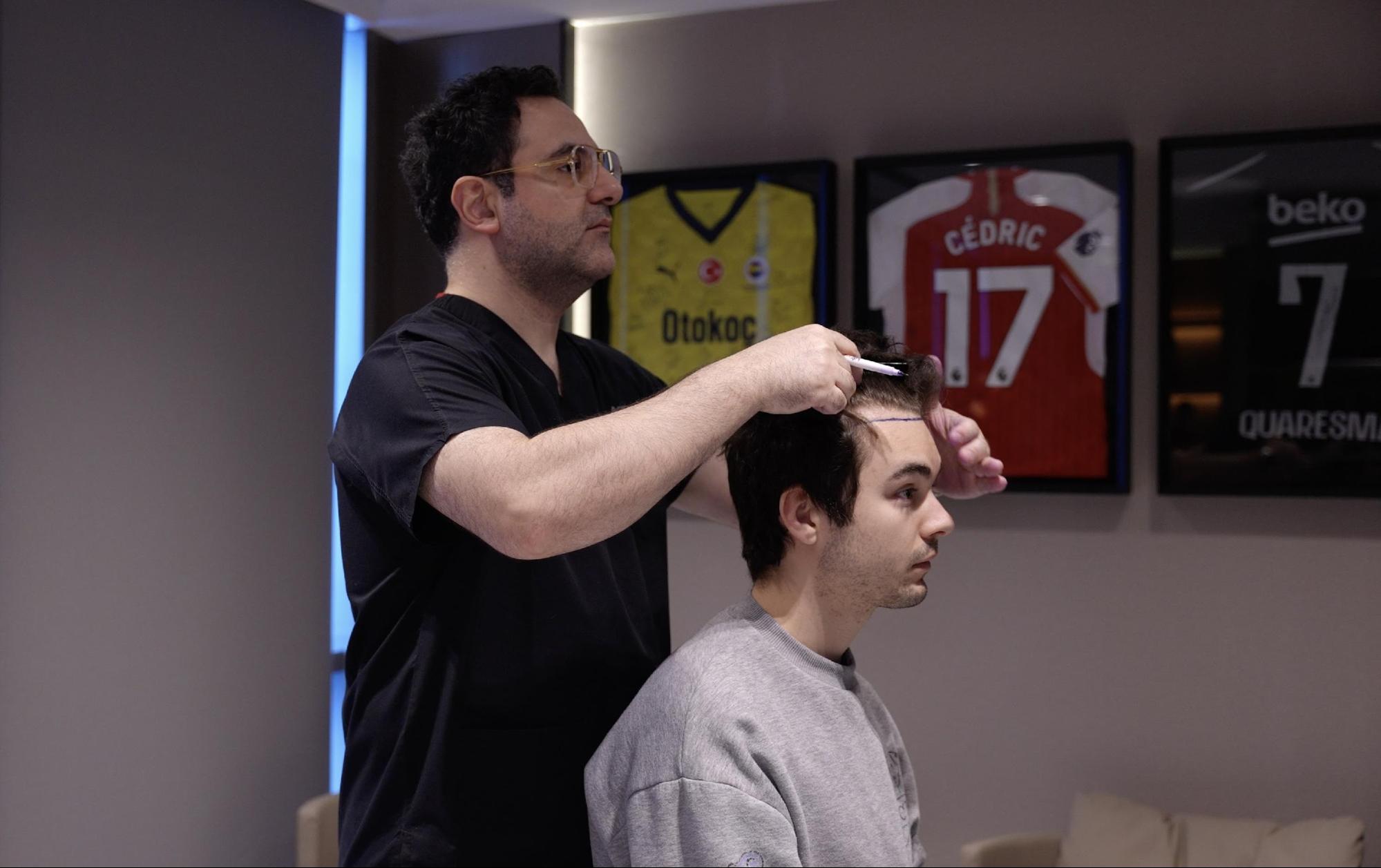 Dr Levent Acar, founder and head surgeon of Cosmedica Clinic, during a hair transplant consultation.