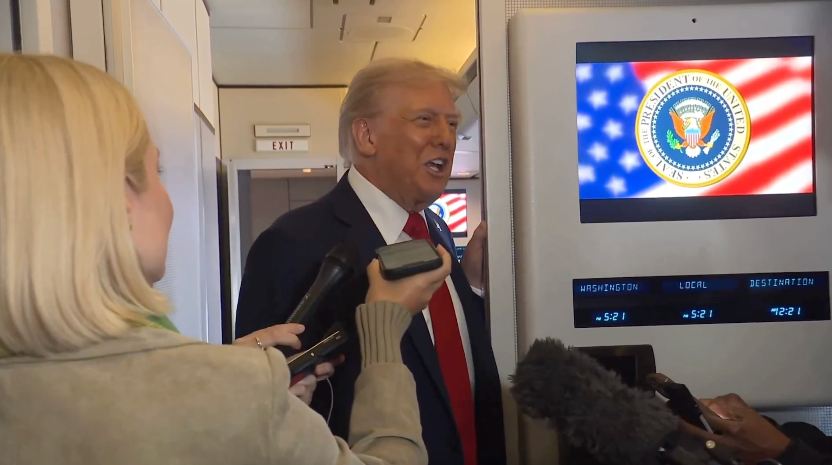 President Donald Trump jokes with reporters about his chances of entering heaven aboard Air Force One on Sunday October 12 2025