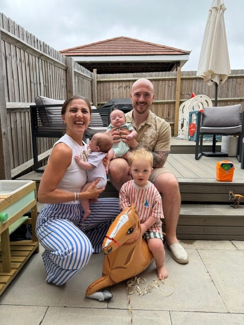 Jade with her partner Dan and their three children, born after the couple lost their first two children