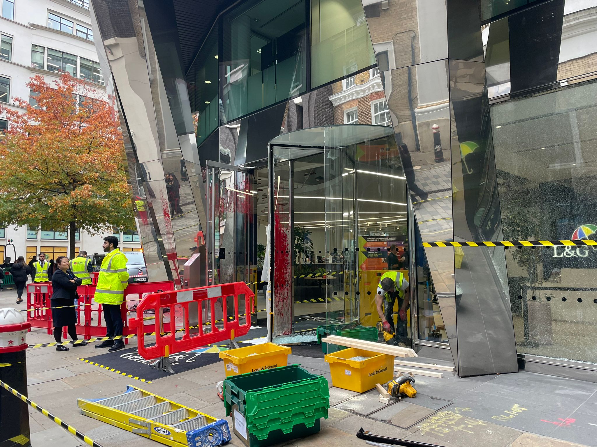 The headquarters of the international insurance and asset management group was covered with red paint