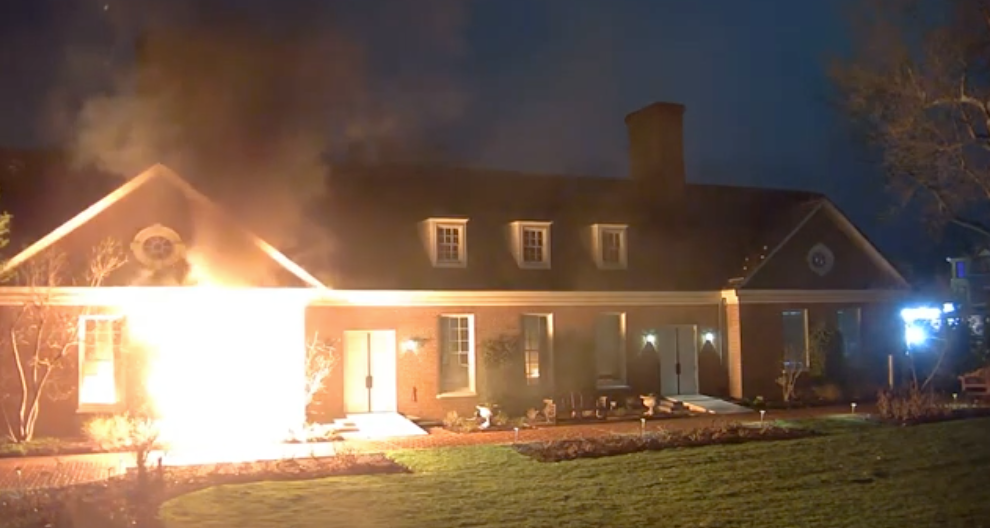 Footage shared Tuesday in court also showed Balmer throwing Molotov cocktails into the residence, quickly starting a fire