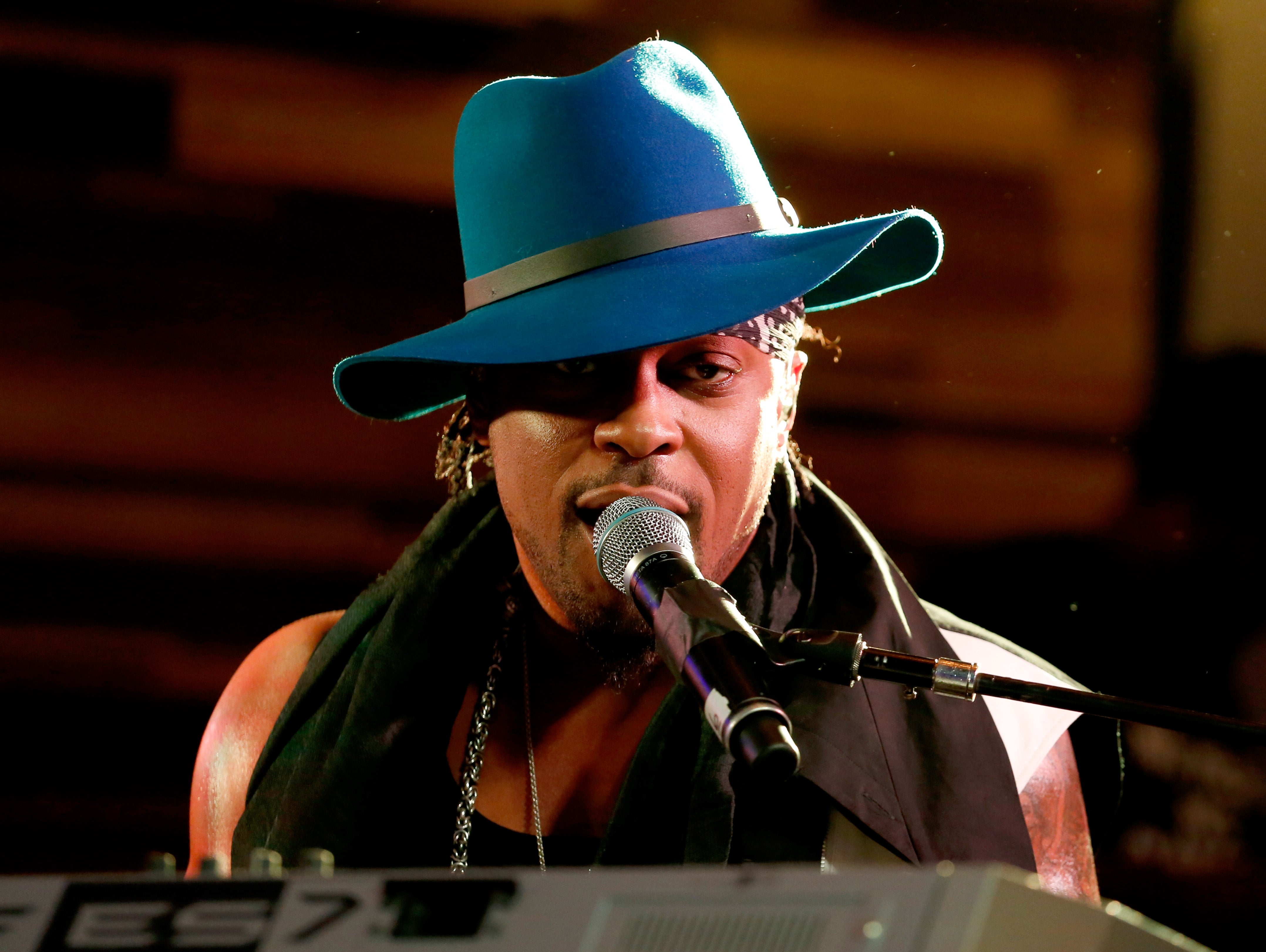D'Angelo performing onstage during in Austin, Texas, in 2015