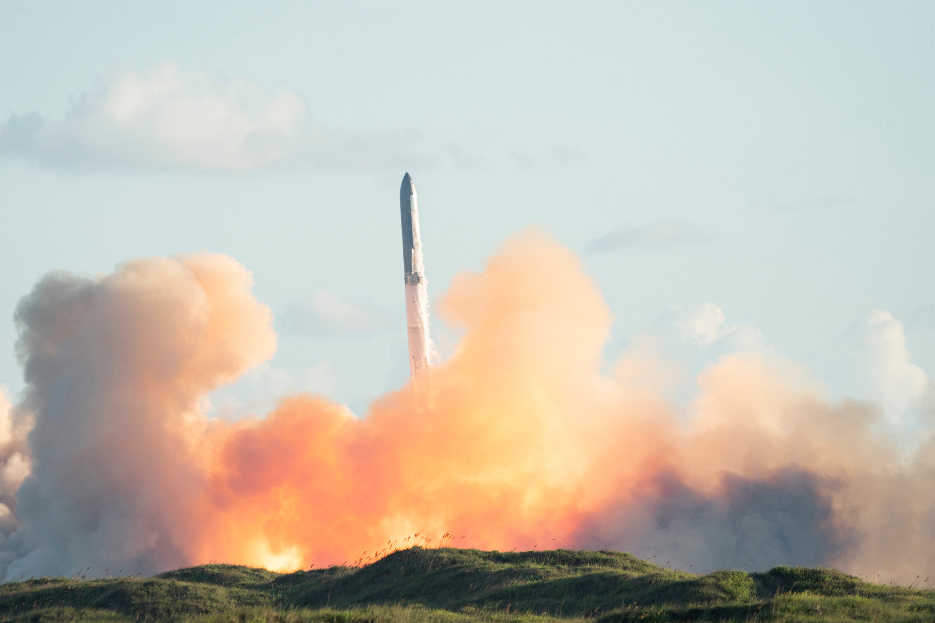 SpaceX's Starship rocket launches from South Padre Island in Texas during its eleventh test flight on October 13, 2025. When the Starship is operational it will haul 60 Starlink satellites to orbit at a time