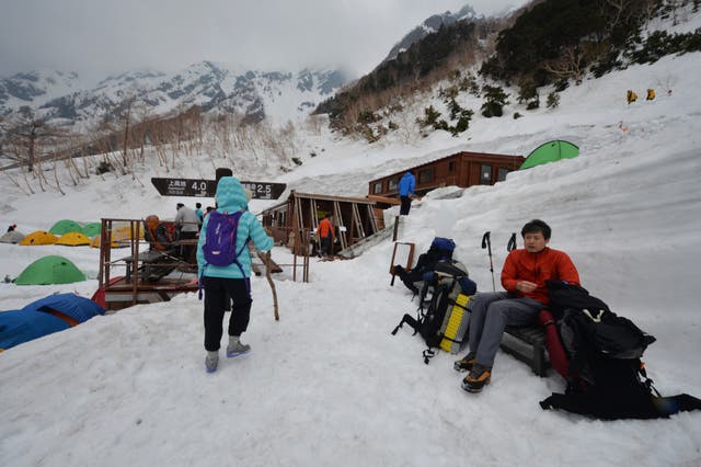 <p>File. Hikers climb Mount Okuhotakadake near Kamikochi, Japan</p>