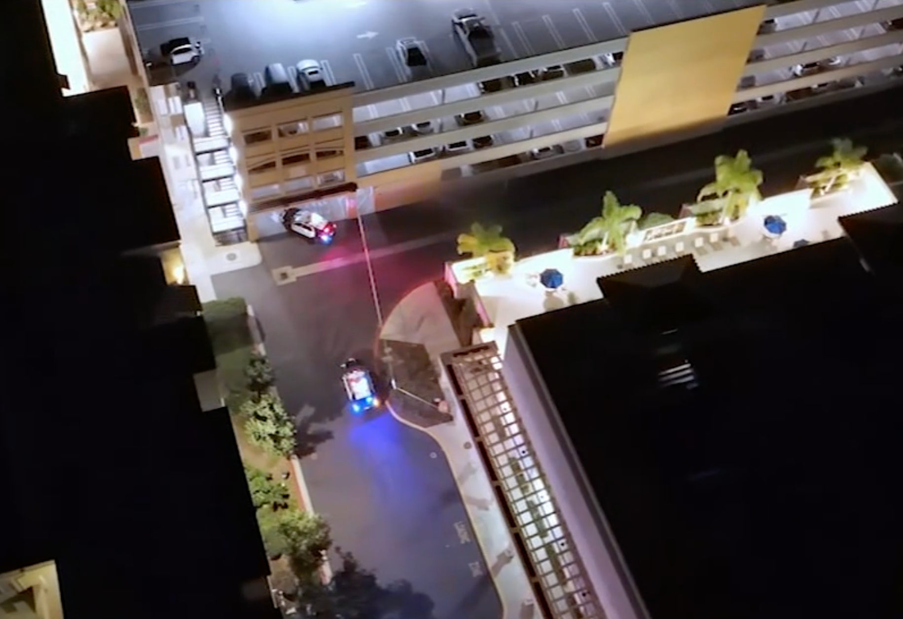 Police at the parking garage in the Town Center area of Valencia, California, where the body of Carrie Elizabeth Romney was discovered on Friday, October 10, 2025