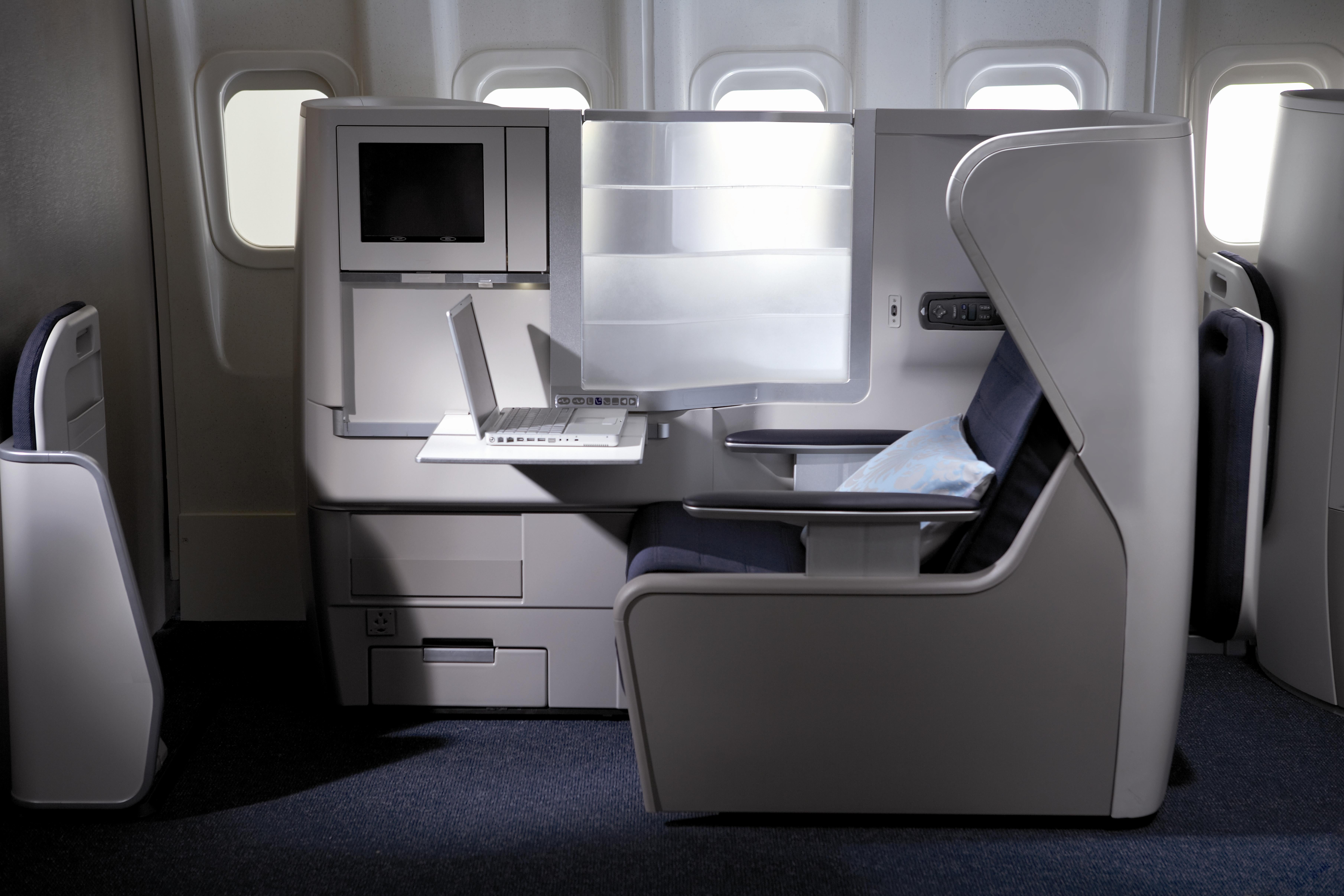 The business-class seats on BA A380s are arranged in a 2-3-2 yin-yang formation, with adjacent seats facing each other, train-carriage style