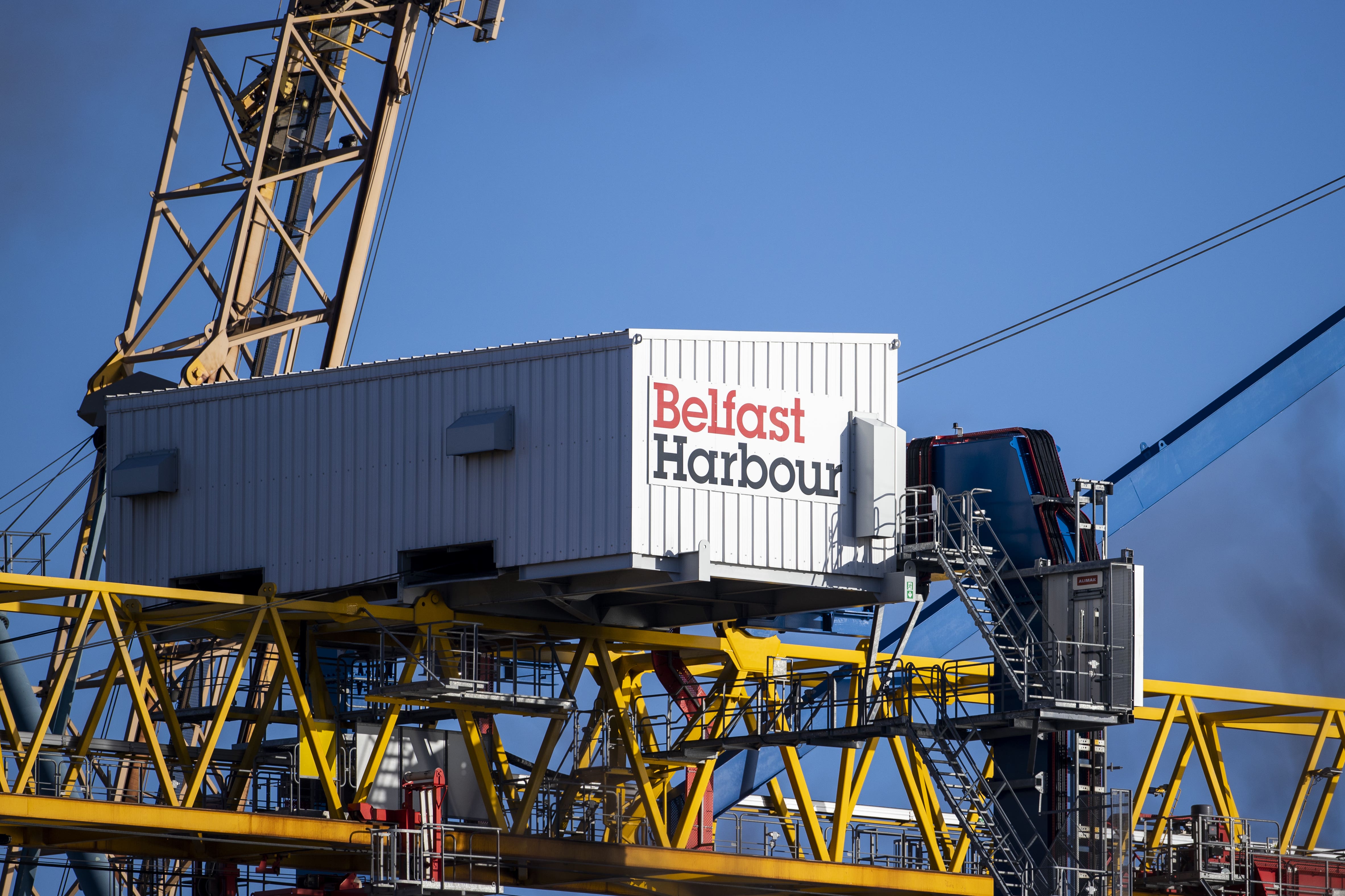 A general view of a Belfast Harbour sign on a container crane at at the Port of Belfast. Picture date: Monday January 16, 2023.