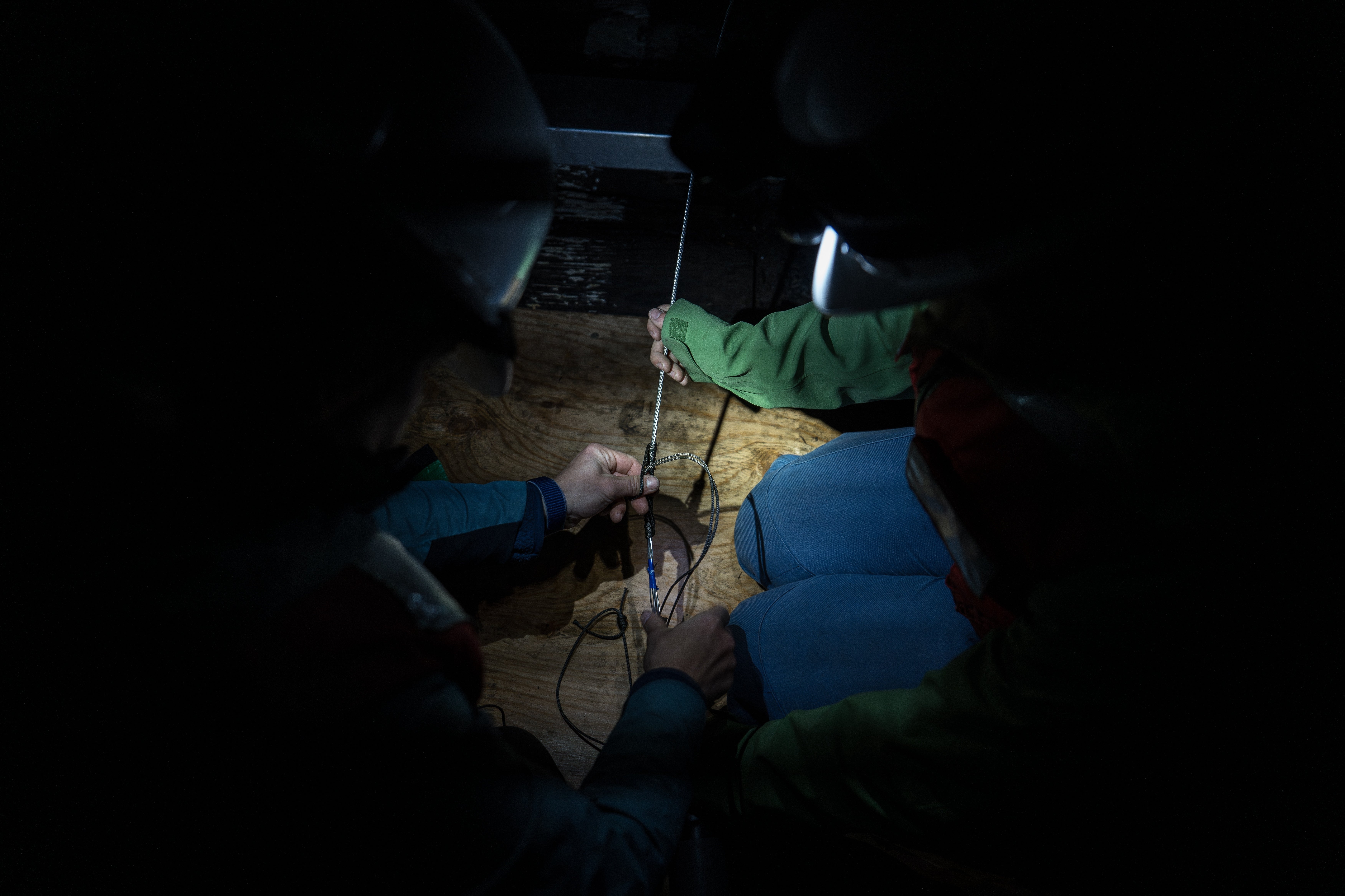 Researchers from the University of Washington prepare to deploy a 1.3-mile fiber-optic cable to test whether internet cables can detect endangered orca vocalizations near San Juan Island, Wash.