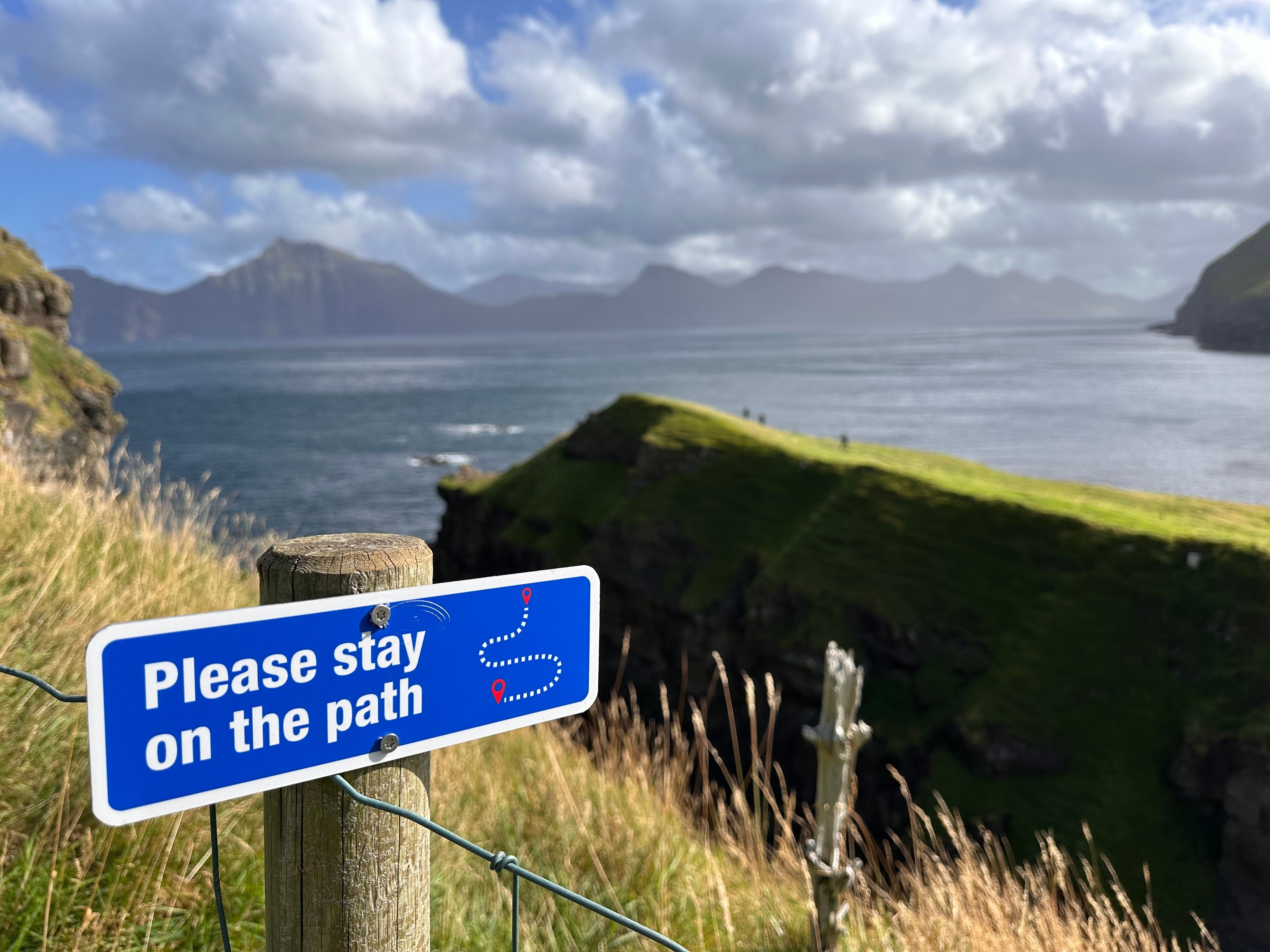 A sign warns tourists in Gjogv at the Faroe Islands, Sept. 8, 2025.