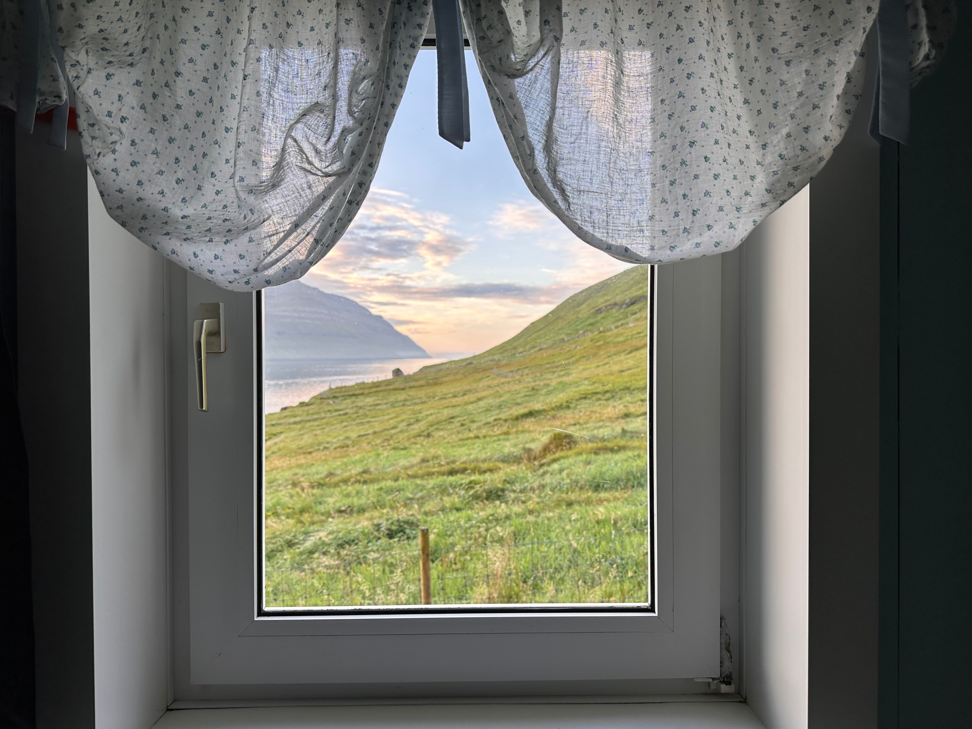 The view from an Airbnb in Sydradalur on Kalsoy Island in Faroe Islands.