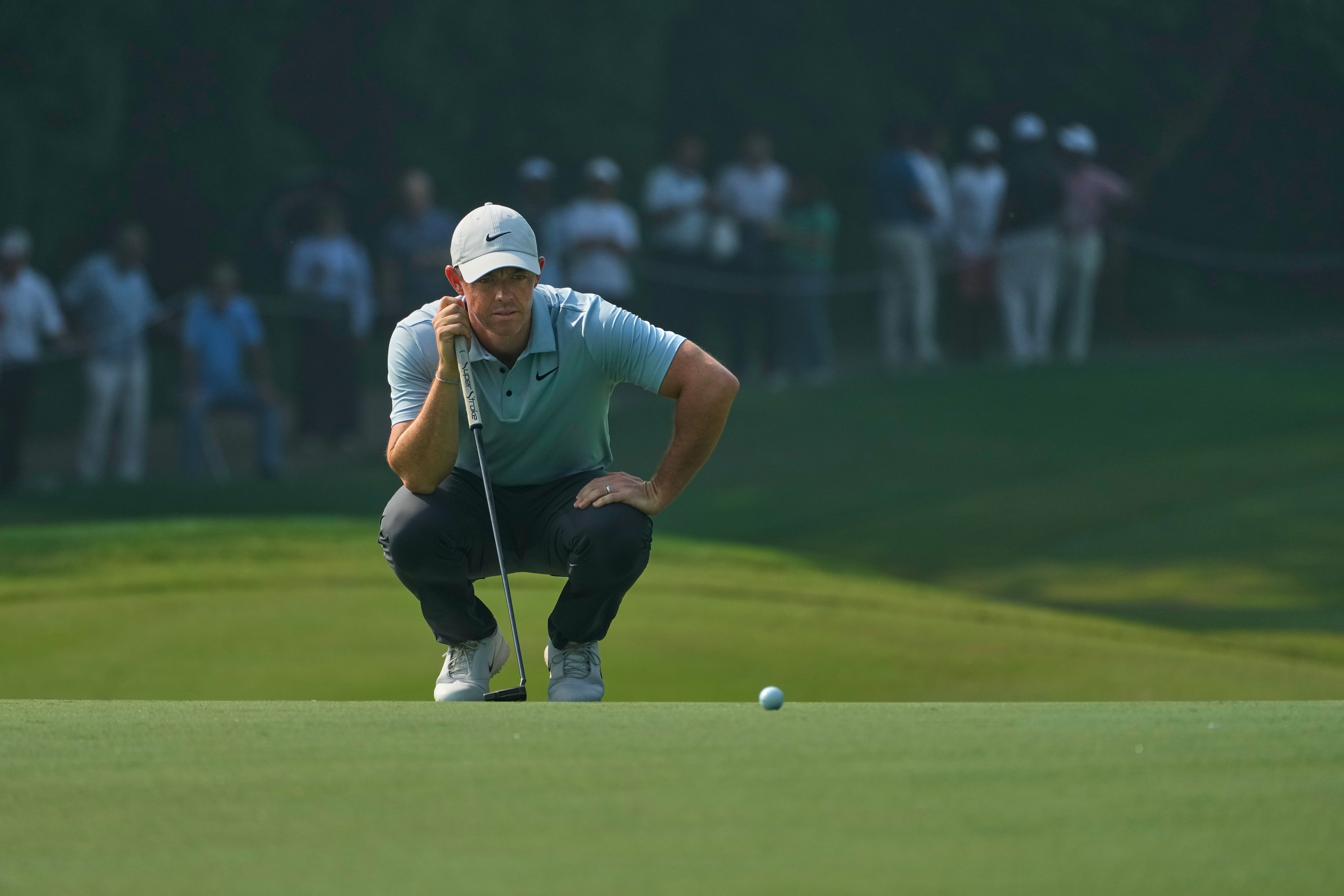 McIlroy rolled in six birdies and three bogeys in Delhi (Manish Swarup/AP)
