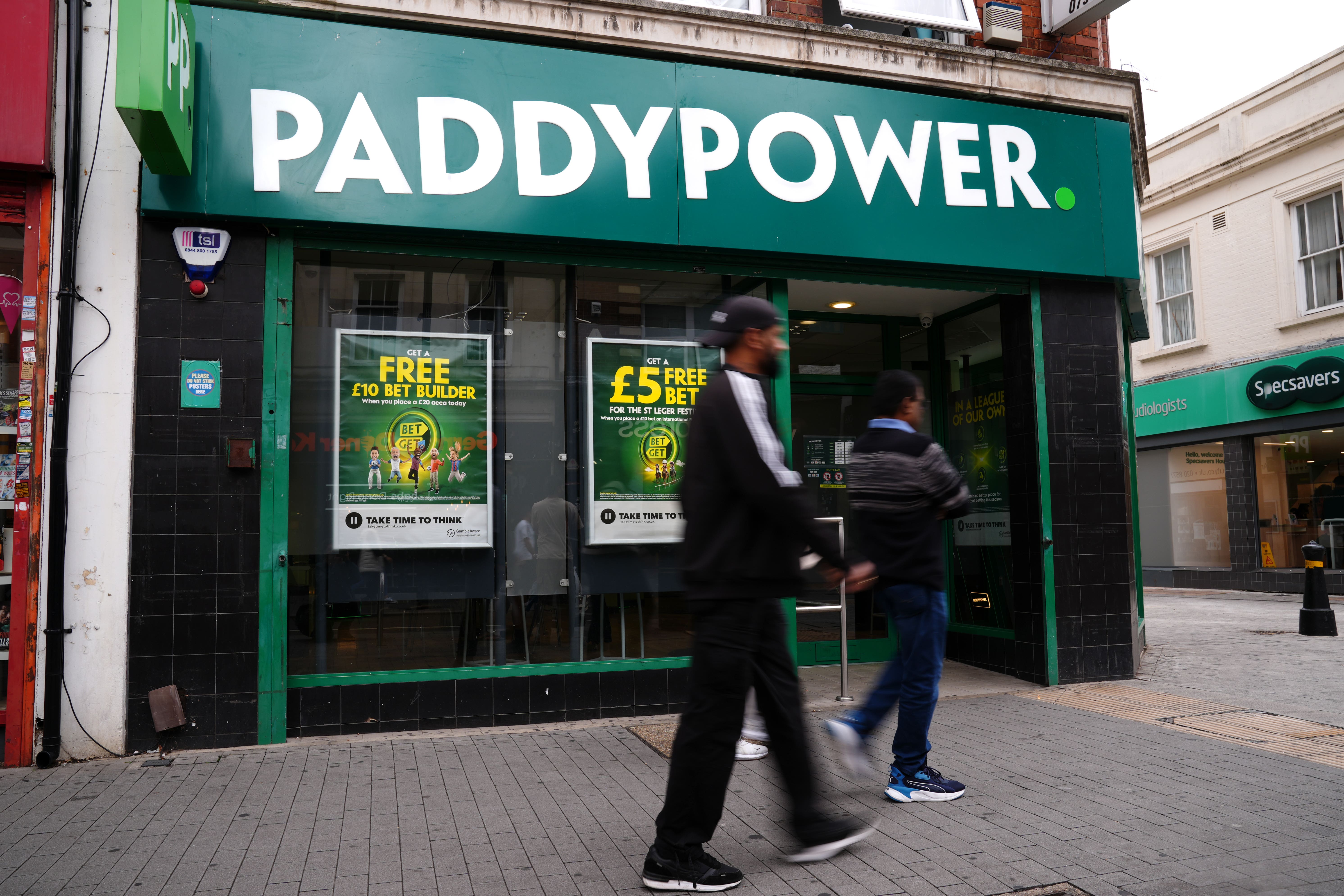 Paddy Power is to shut dozens of betting shops across the UK and Ireland (John Walton/PA)