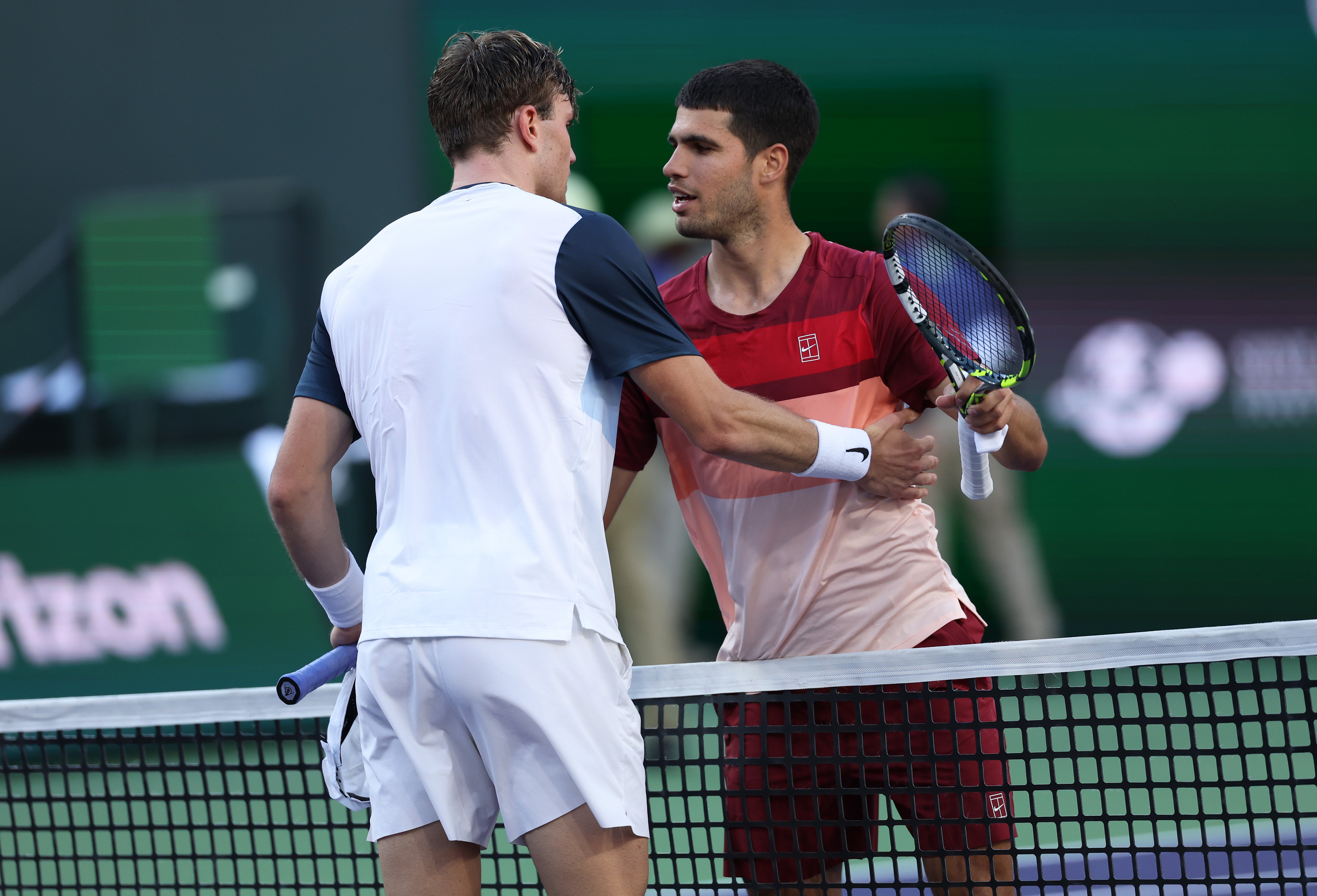 Jack Draper of Great shakes hands at the net after his three set victory against Carlos Alcaraz at Indian Wells