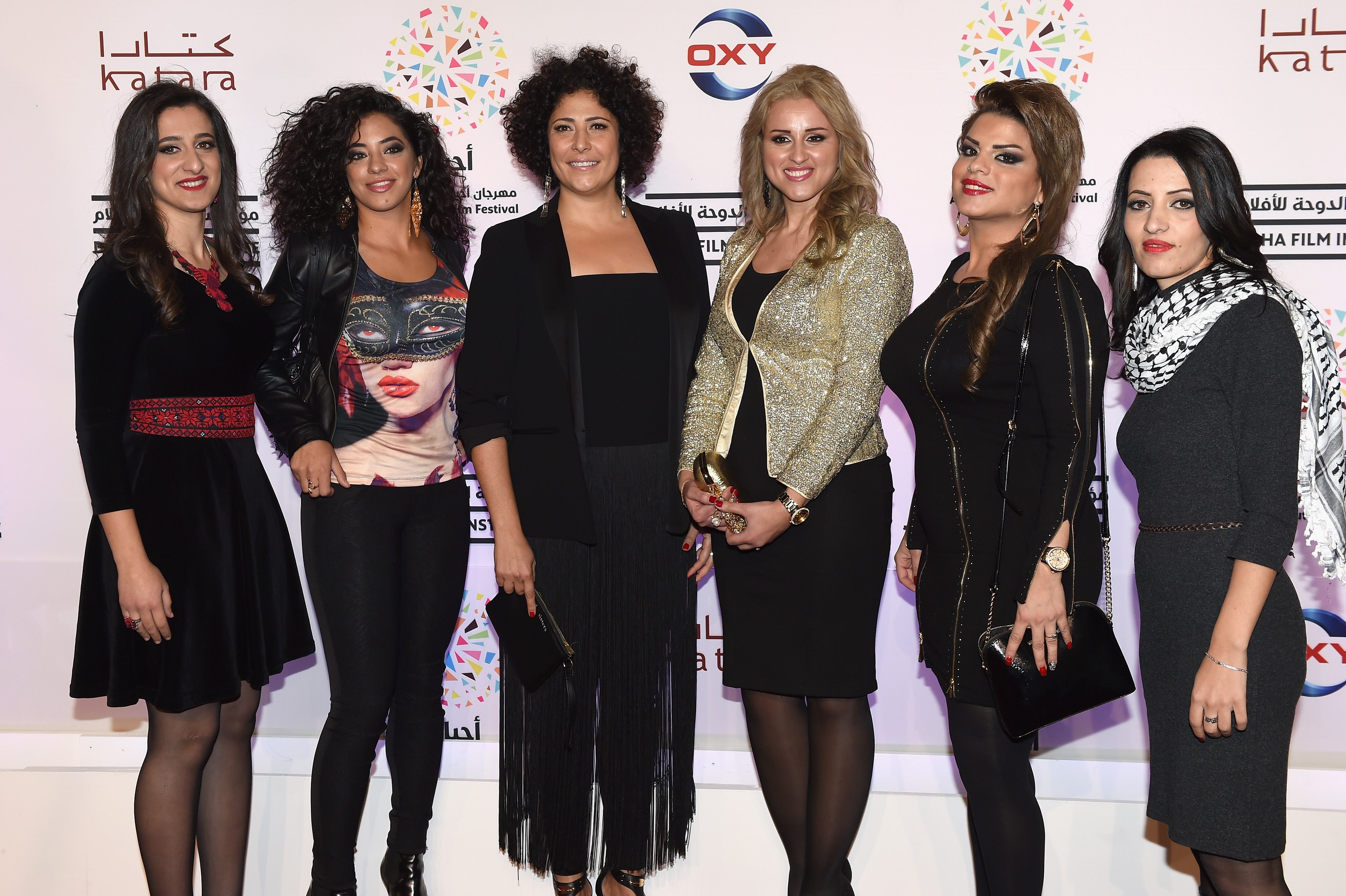 Director Amber Fares, third from left, with the Speed Sisters at a film festival in Doha, 2014