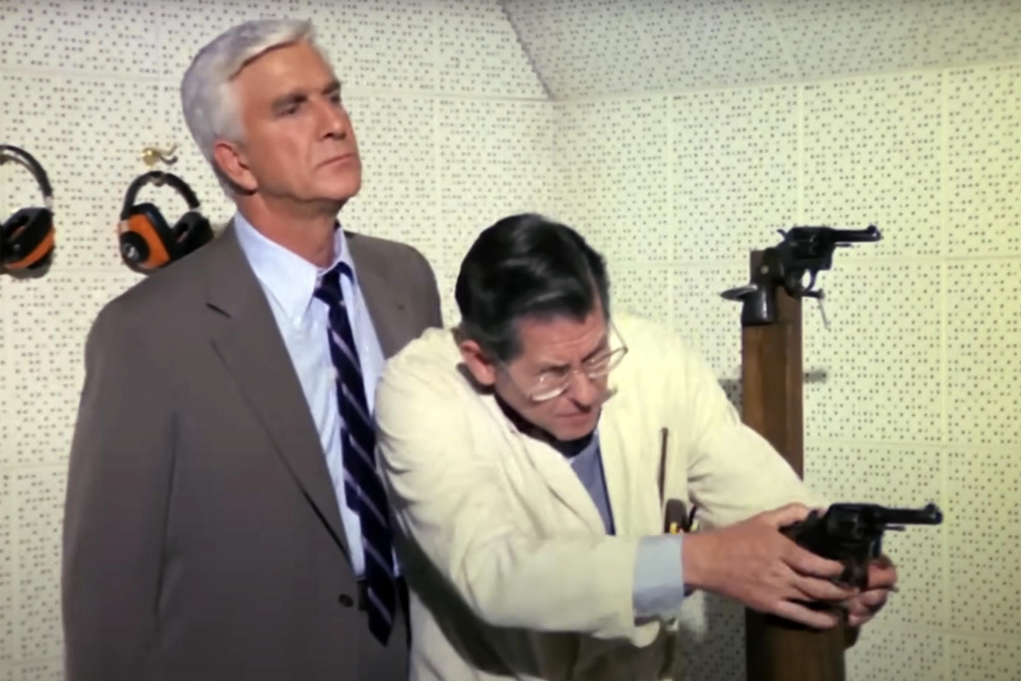 Ted Olson demonstrates firing a pistol in an episode of ‘Police Squad!’