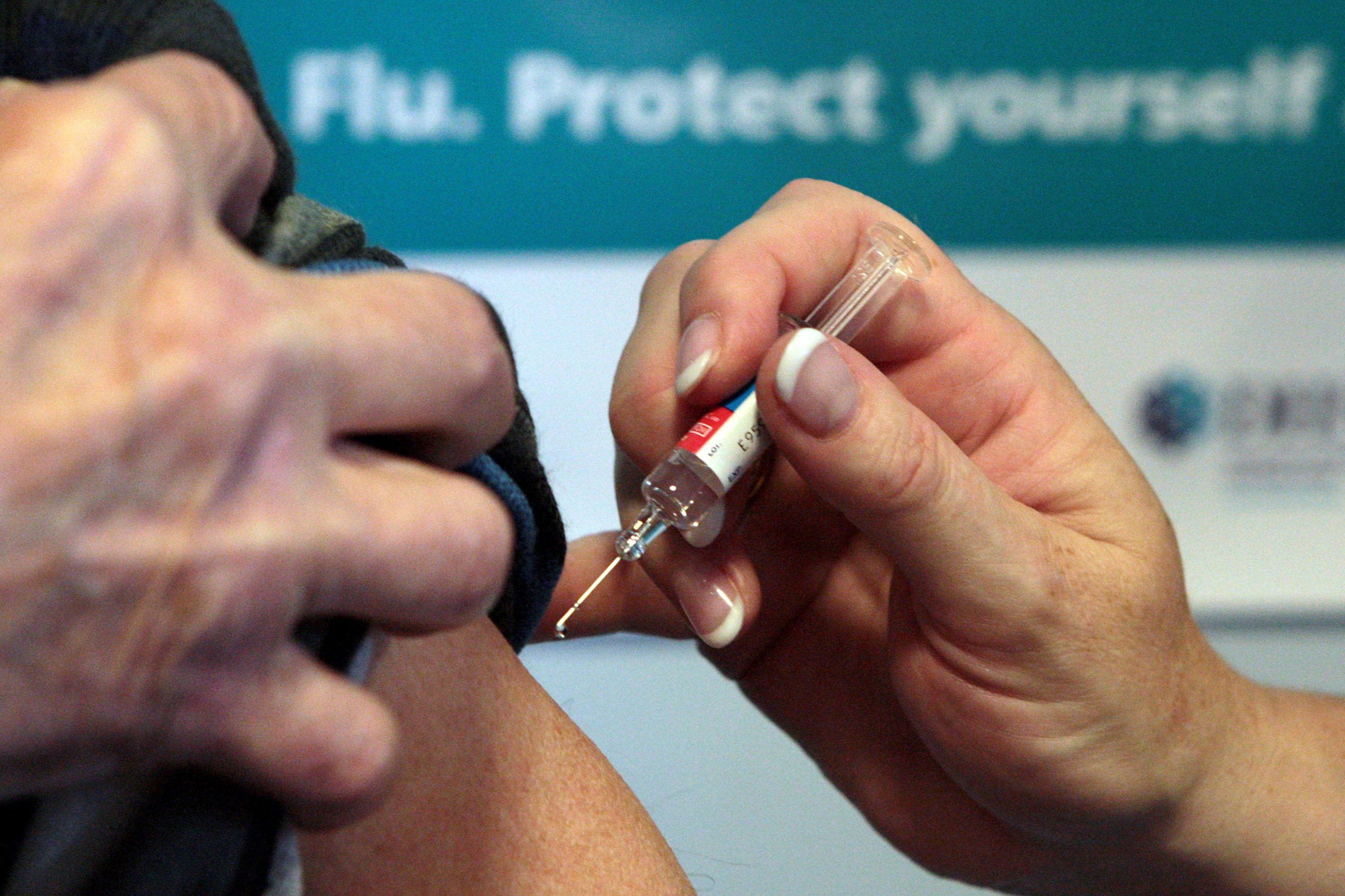 People are being encouraged to get this year’s flu jab (PA)