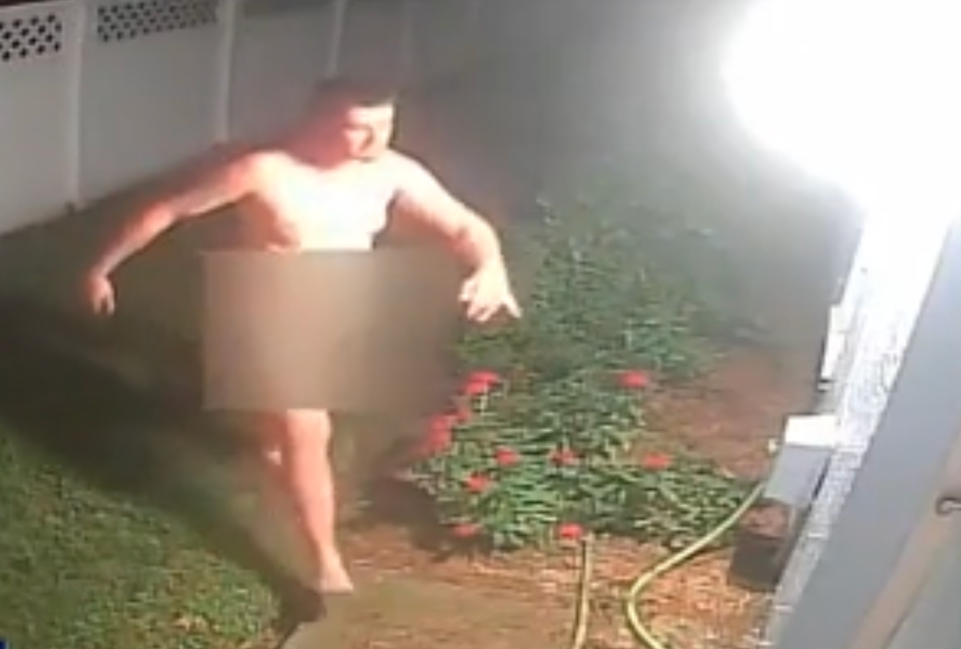 Surveillance video footage showed the naked man trying door handles, removing window screens, destroying property and pressing himself against the glass of a sliding door