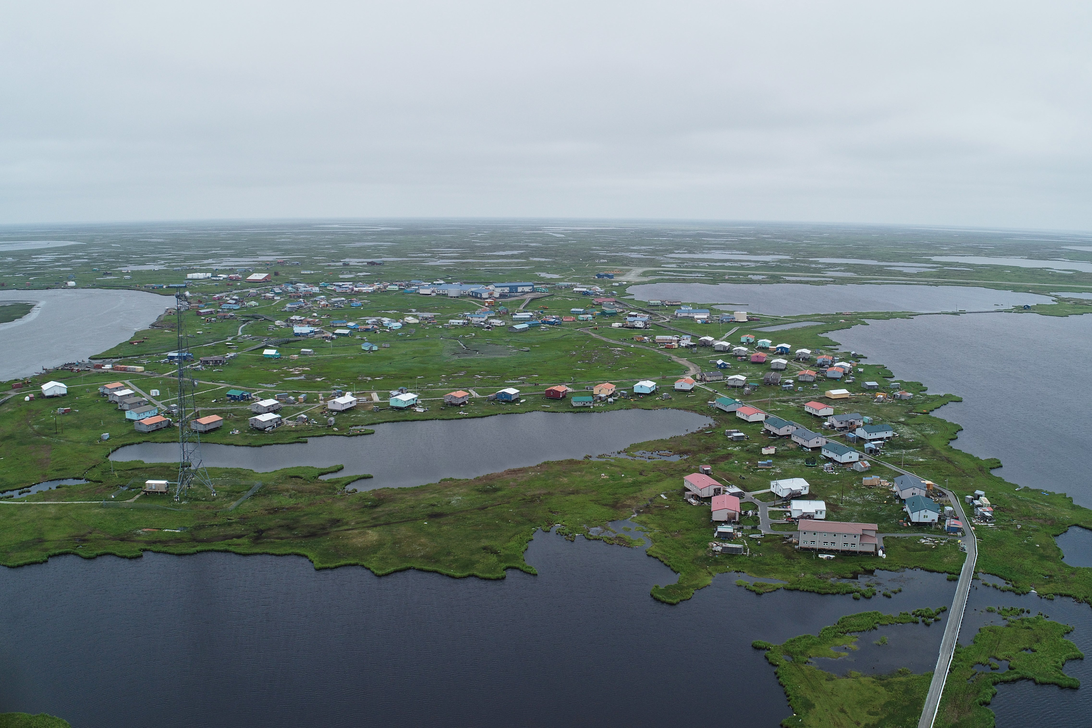 This photo provided by the Alaska Division of Geological Geophysical Surveys shows the village of Kipnuk, Alaska before floods in 2024 and 2025 destroyed many buildings.
