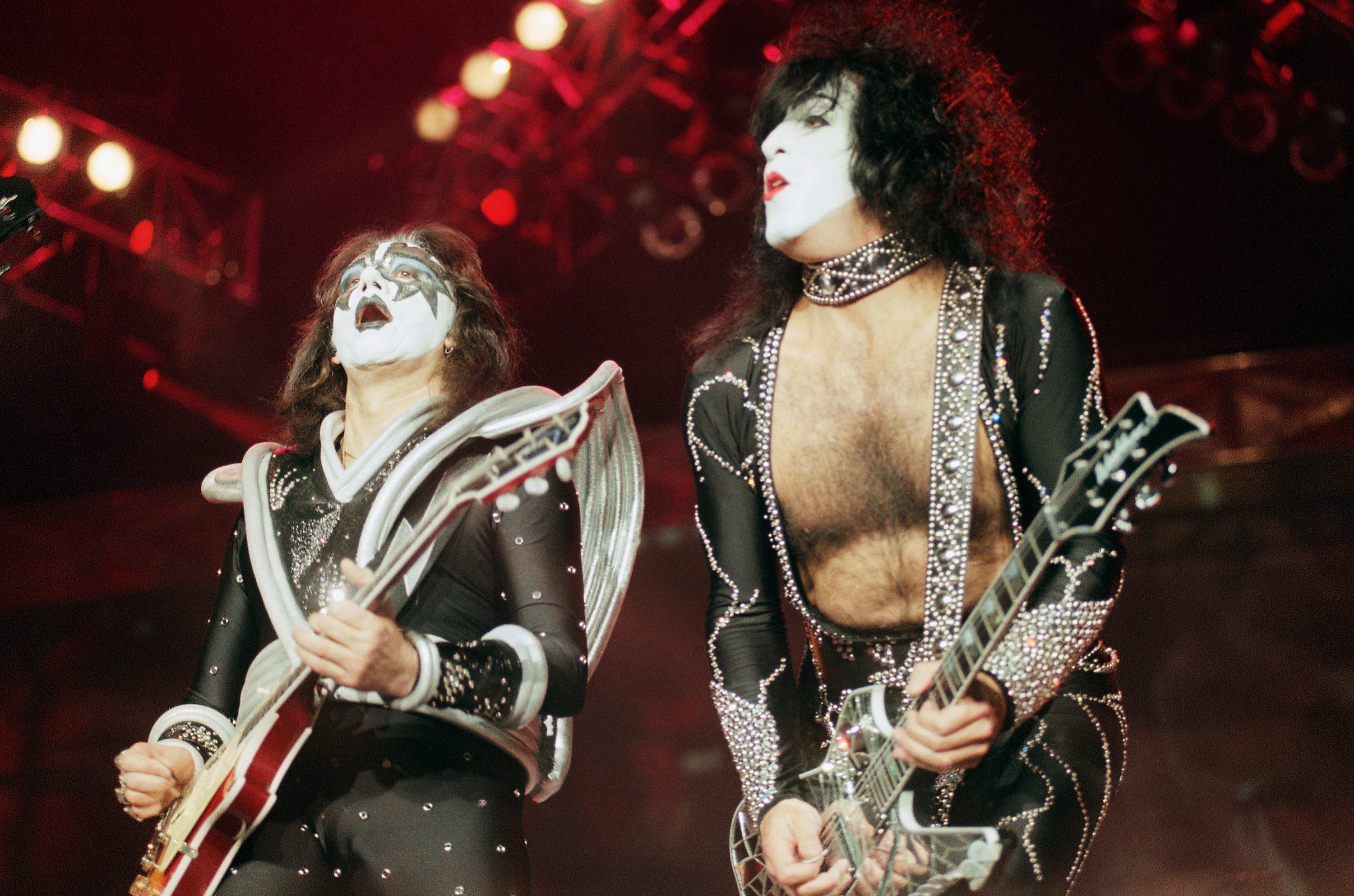 Paul Stanley and Ace Frehley perform during a concert in Los Angeles in 1998.