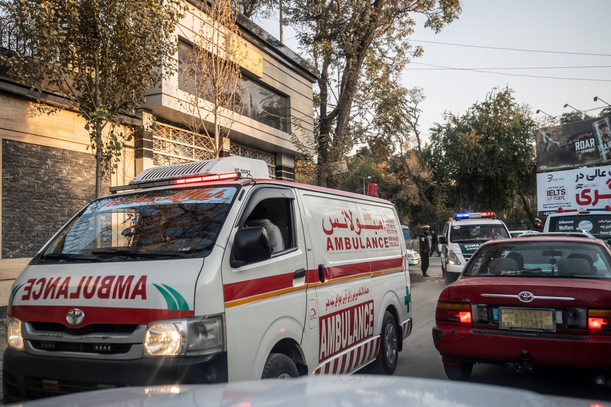 Ambulances rush along a road towards the site of an explosion in Kabul on 15 October 2025, amid heavy border clashes between Afghanistan and Pakistan