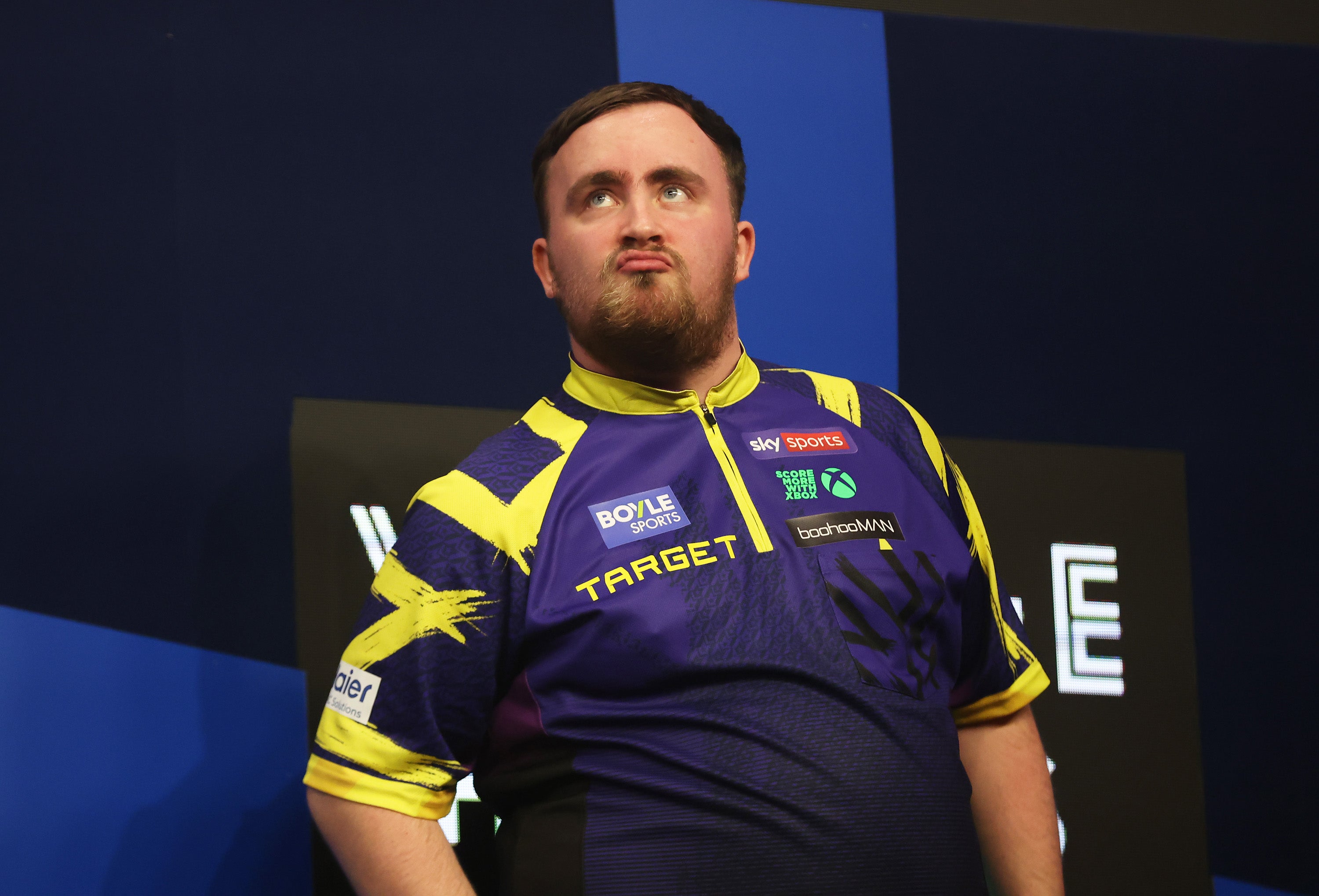 <p>Luke Littler hit back at his critics after competing at the World Youth Championship</p>