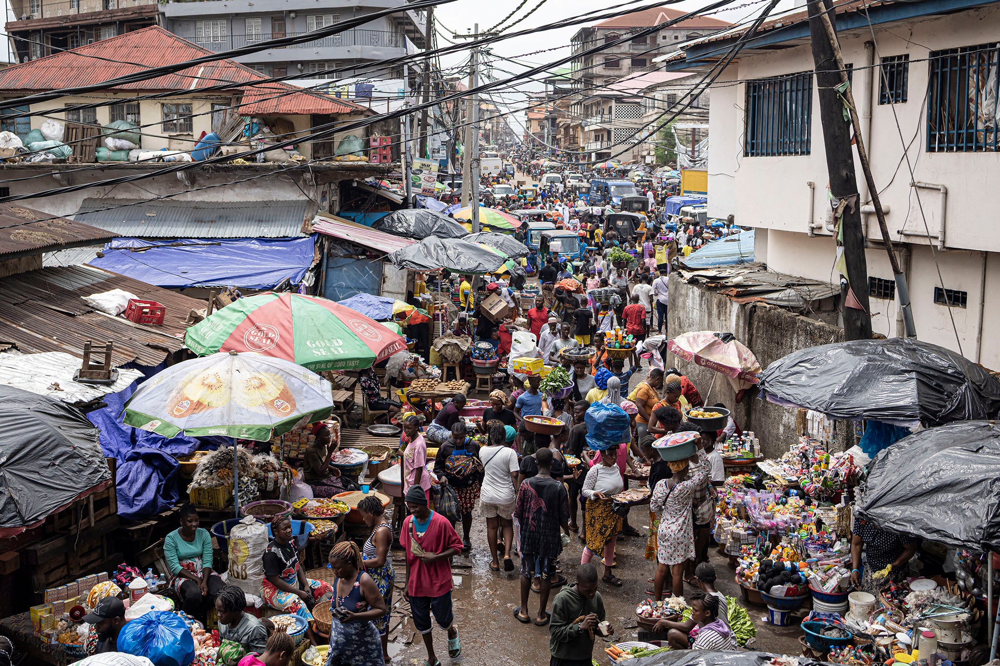 Sierra Leoneans are seen at Dove Cot Market in the country’s capital, Freetown, earlier this year
