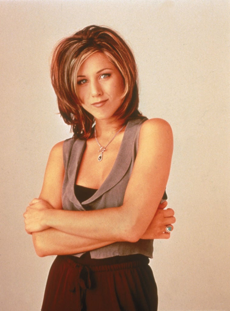 Retail trends like low-cut jeans, leopard print, and mules have resurfaced and the fashion of 90s style icons Carolyn Bessette-Kennedy, Jennifer Aniston (pictured) and Aaliyah, to name a few