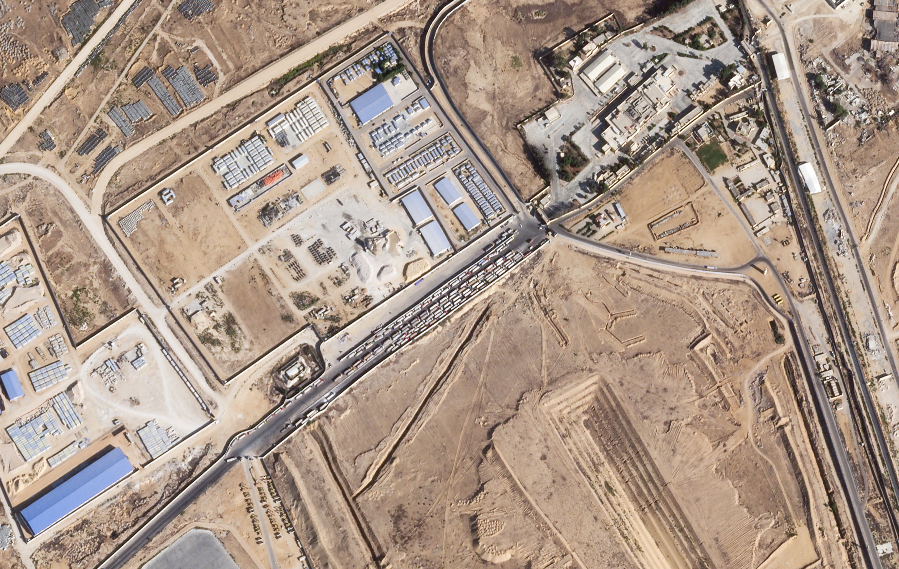 Trucks lined up on the Egyptian side of the Rafah border crossing with the Gaza Strip in October