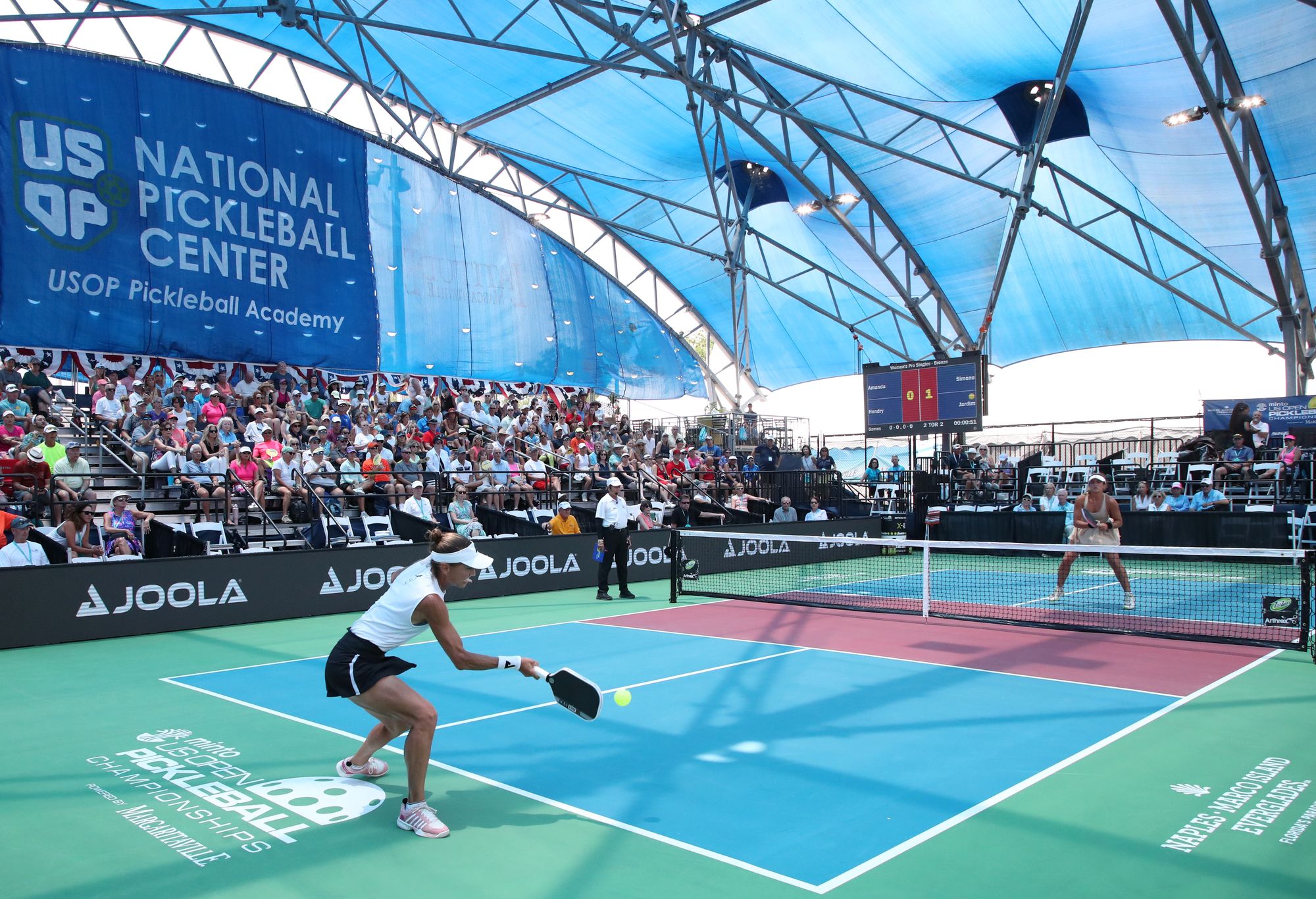 Simone Jardim hits a forehand drive shot against Amanda Hendry during the 2025 US Open Pickleball Championships