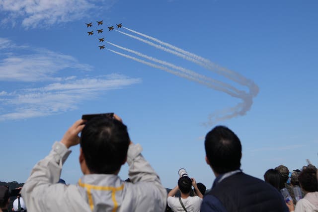 <p>South Korean Air Force's Black Eagles demonstration team perform during the Seoul International Aerospace & Defense Exhibition (ADEX) 2025 at the Seoul airport in Seongnam, South Korea</p>