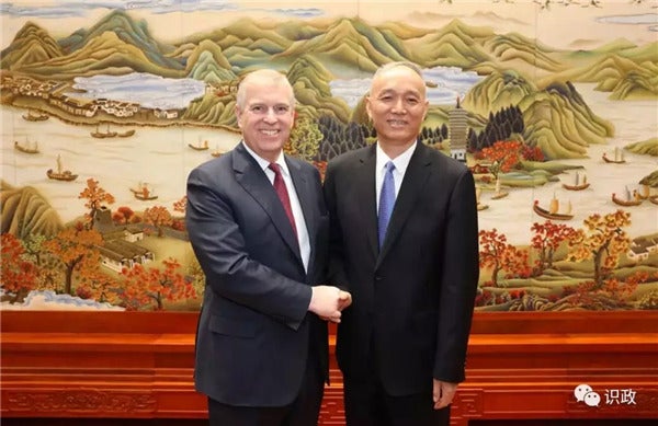 Andrew with Cai Qi, the alleged ‘spymaster’ at the heart of the collapsed China spy case