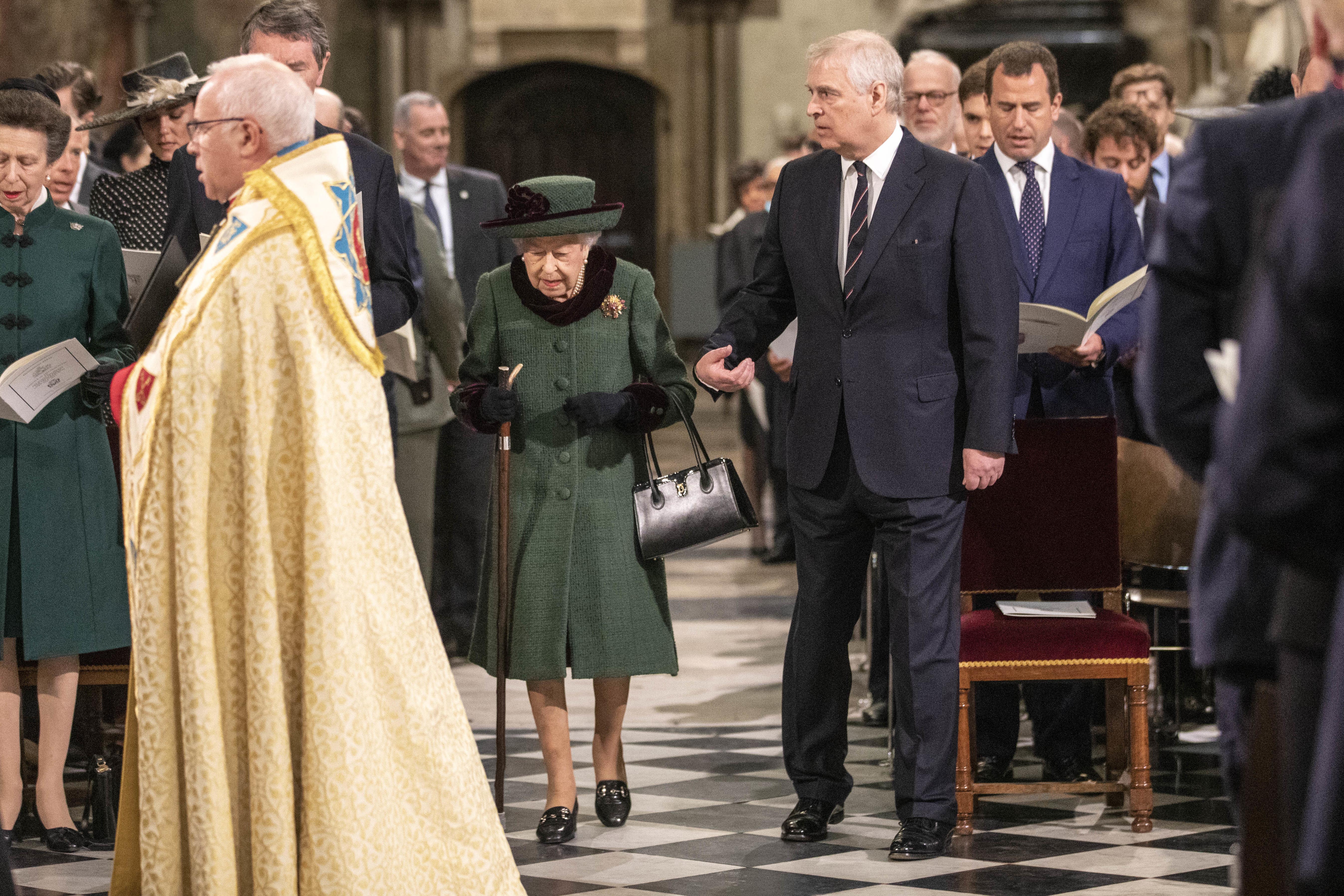 Queen Elizabeth II and the then-Duke of York arrive at a Service of Thanksgiving for the life of the Duke of Edinburgh during the Platinum Jubilee year (Richard Pohle/The Times/PA)