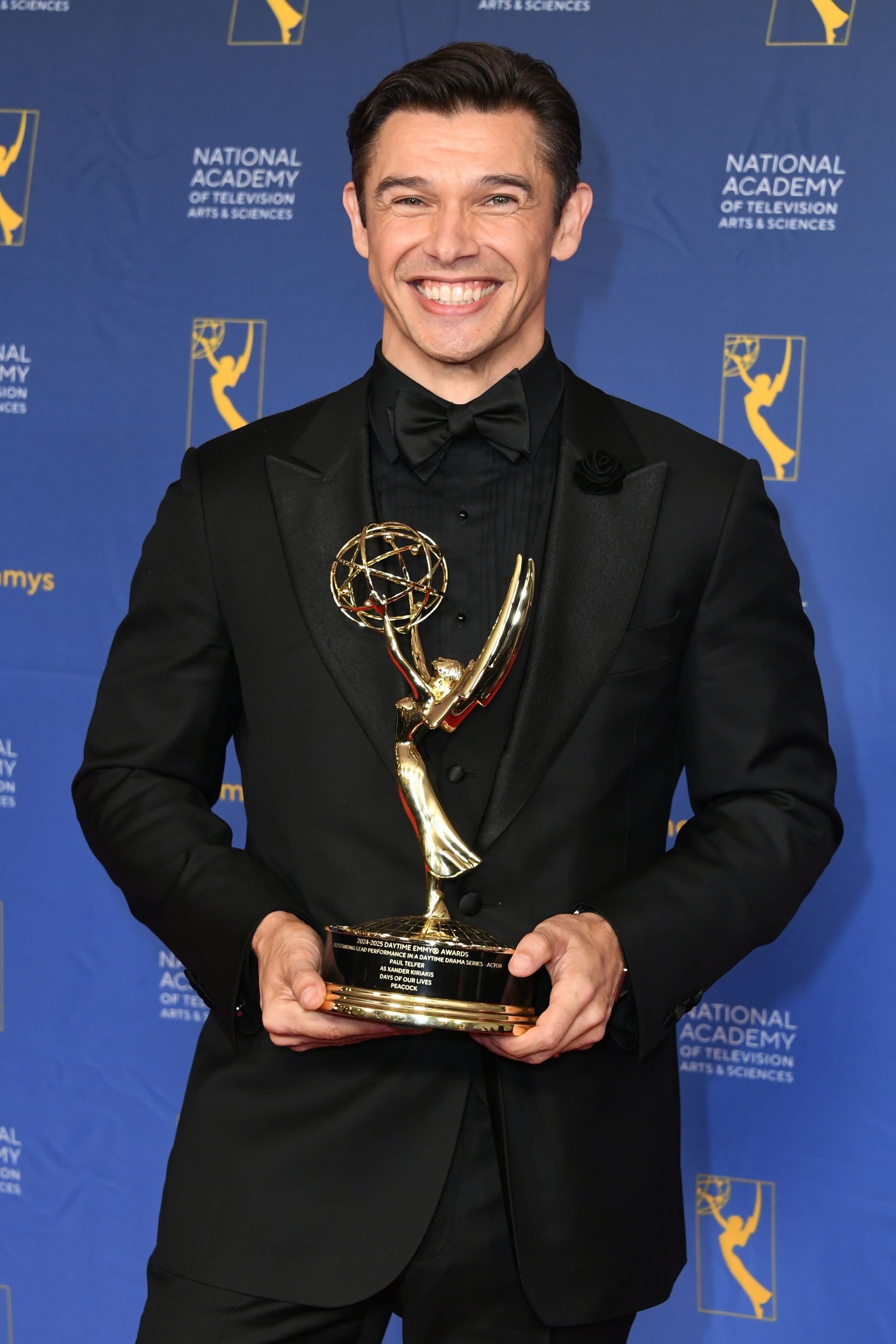 Paul Telfer poses with the award for Outstanding Lead Performance in a Daytime Drama Series: Actor for 'Days of Our Lives'