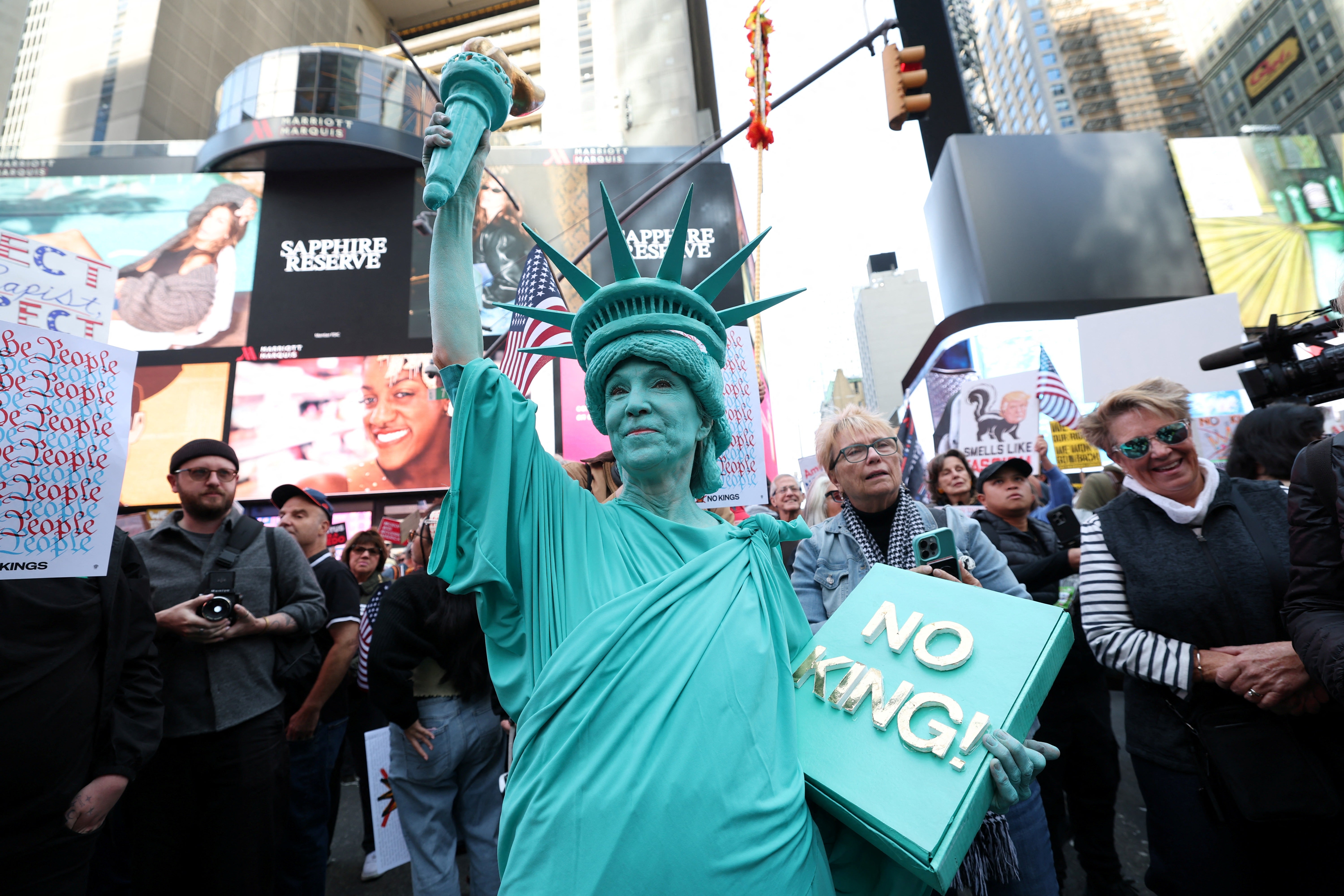 A person dressed in a Statue of Liberty costume in New York