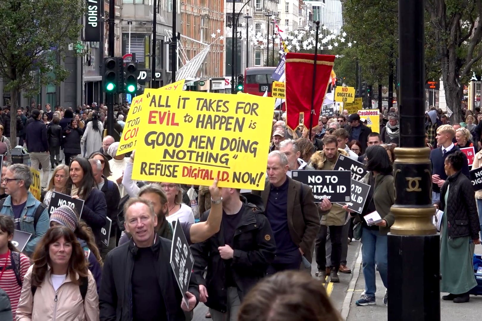 Protesters marching through central London (Zhanna Manukyan/PA)
