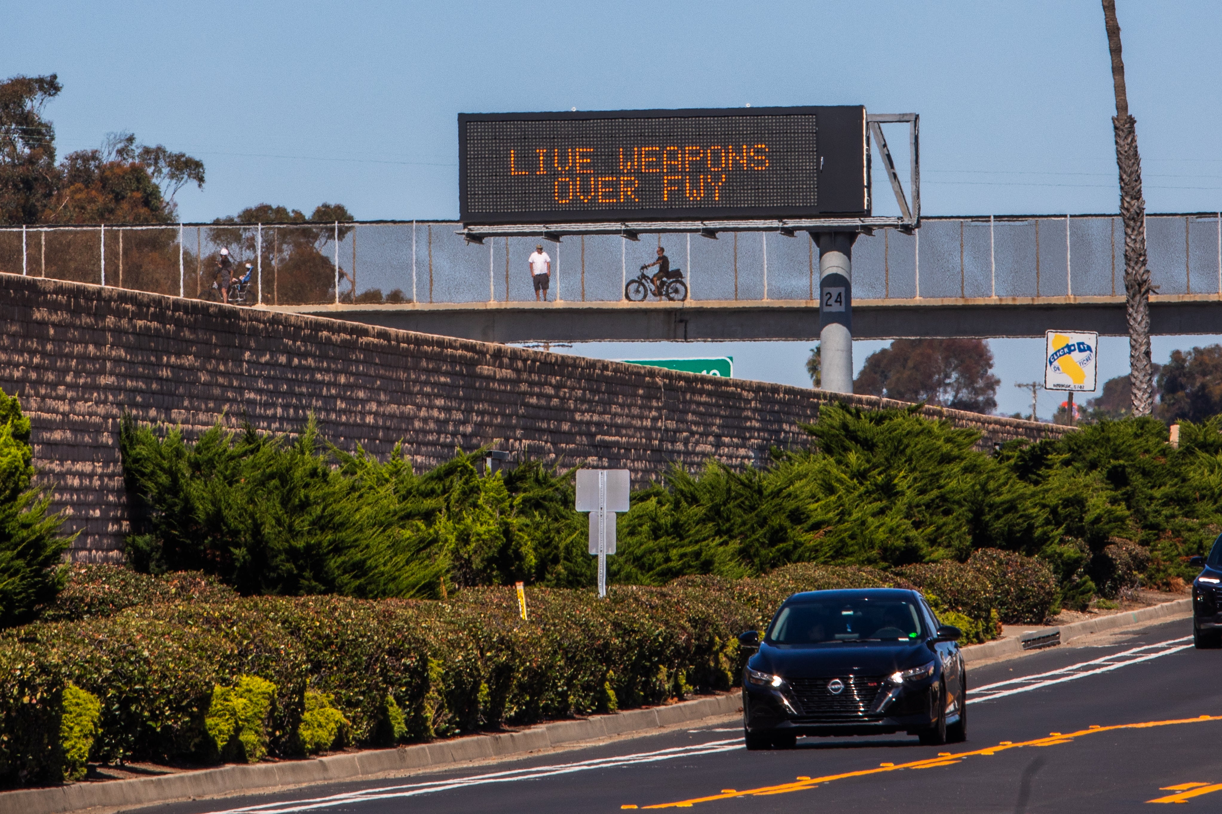 Newsom accuses federal authorities of leaning on the military to conduct an ‘absurd show of force,’ while the White House alleges the California governor unnecessarily closed I-5
