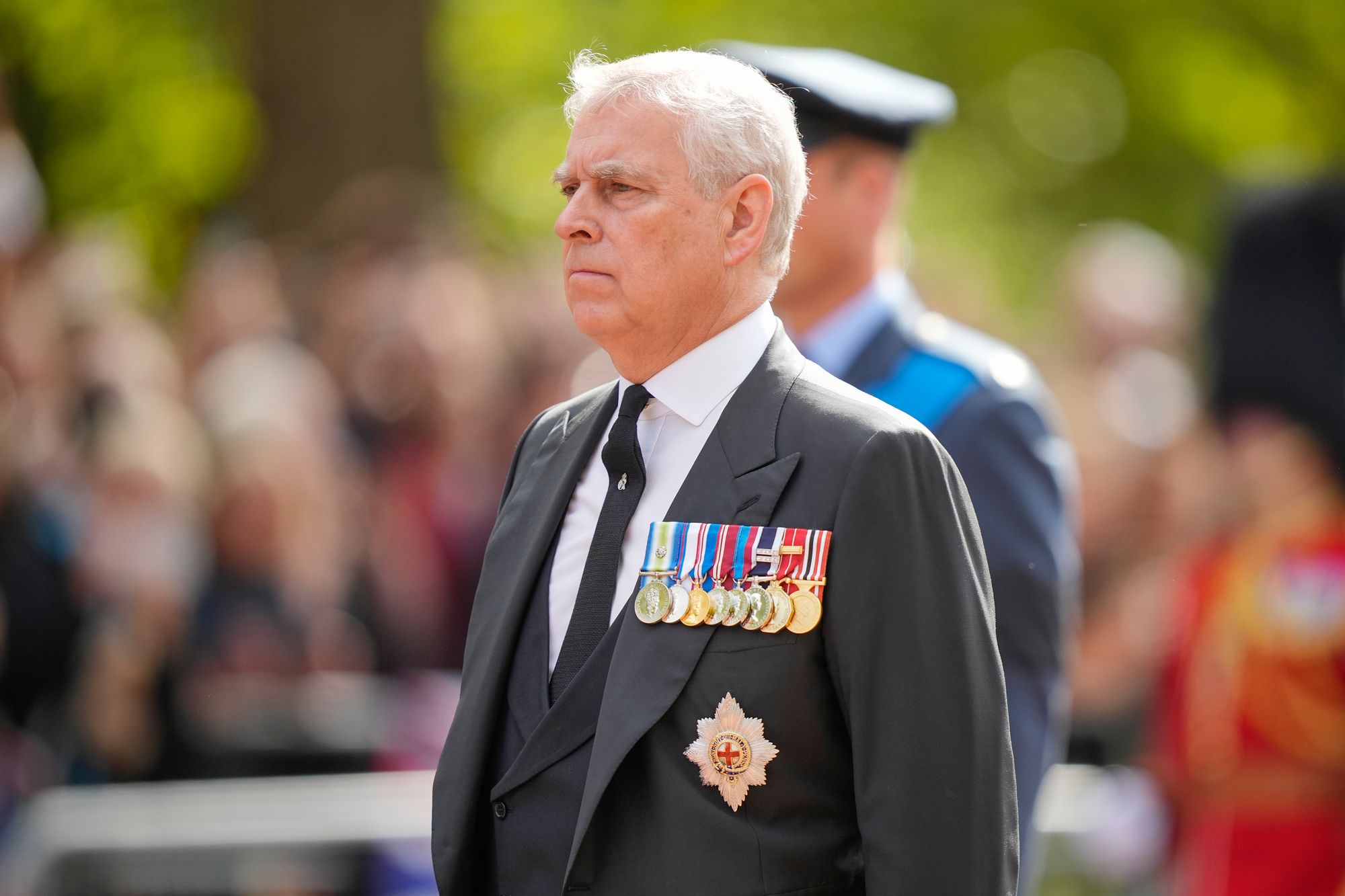 Andrew walks behind the coffin during the ceremonial procession of the coffin of Queen Elizabeth II from Buckingham Palace to Westminster Hall on 14 September 2022