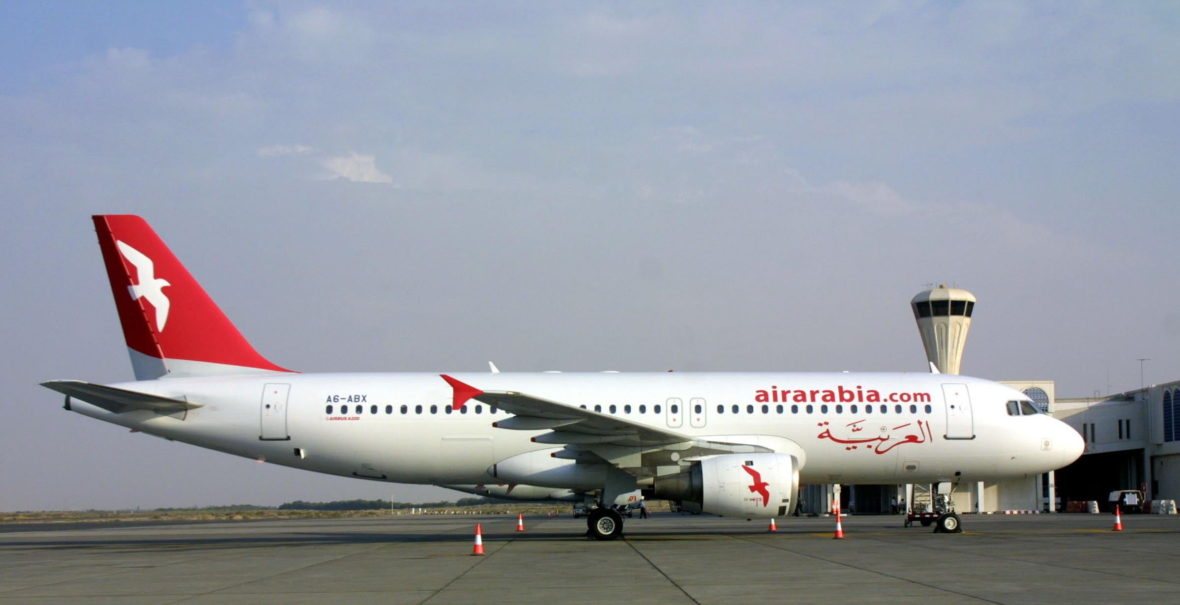 An Air Arabia Airbus 320 aeroplane at Sharjah airport, part of the United Arab Emirates (UAE)