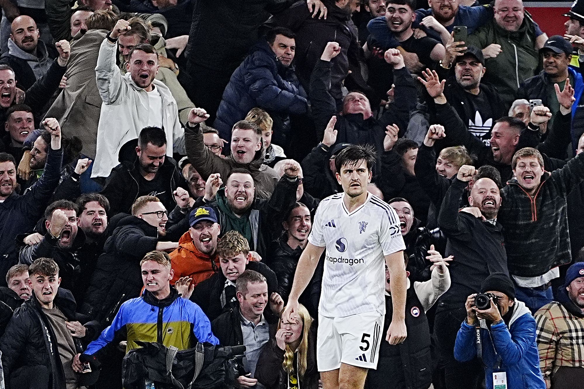 Harry Maguire’s header earned Manchester United victory at Anfield (Peter Byrne/PA).