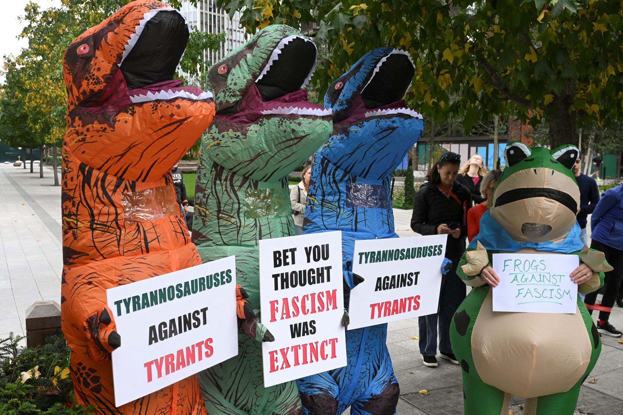 Thousands of people dressed as frogs and dinosaurs were spotted at No Kings protests across America on Saturday