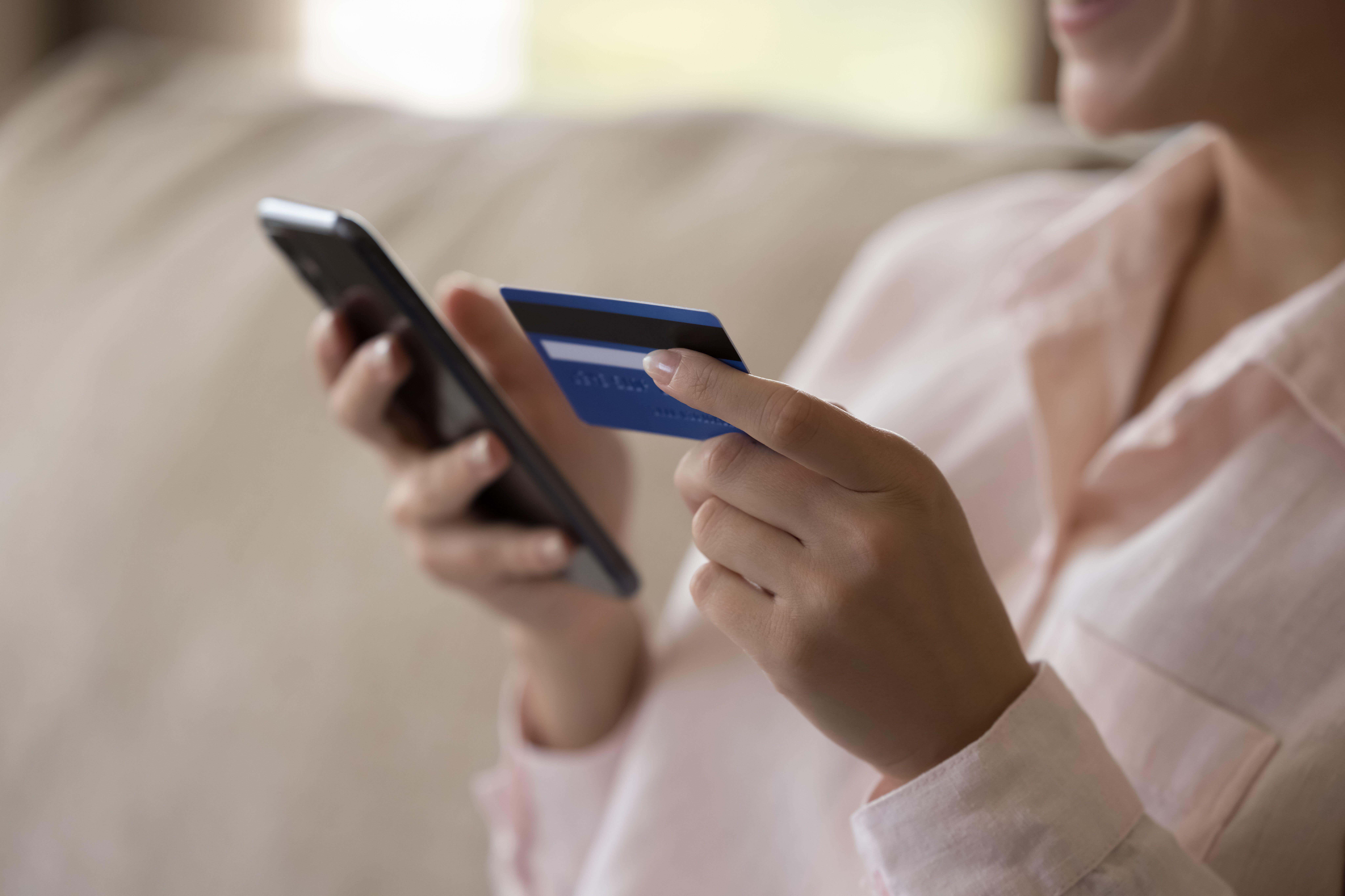 Nearly a fifth of UK-listed firms alerting over profits have flagged the impact of weak consumer confidence, research shows (Alamy/PA)