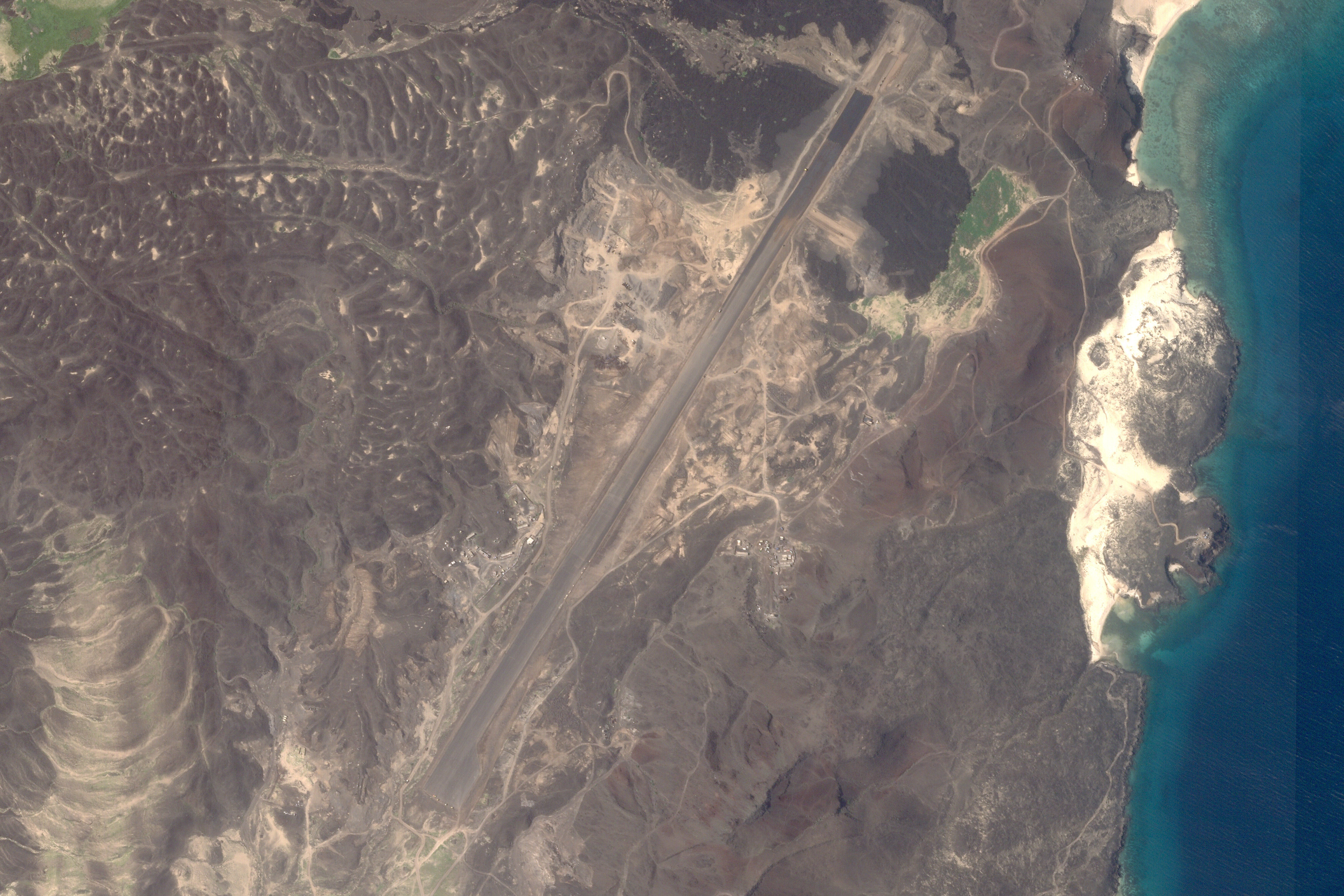 This satellite image from Planet Labs PBC shows an airstrip being built on Zuqar Island, Yemen, in the Red Sea.