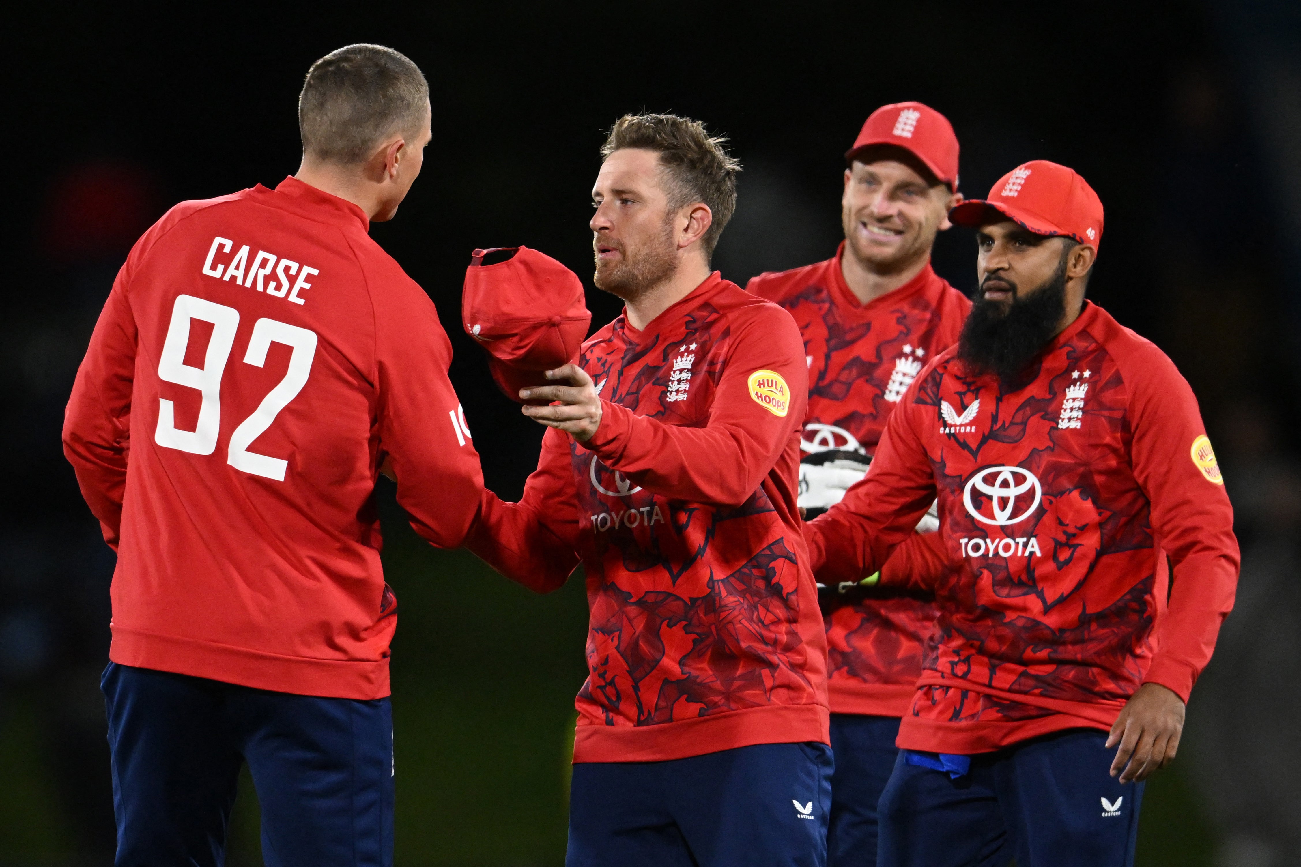 England's players celebrate their T20i win over New Zealand