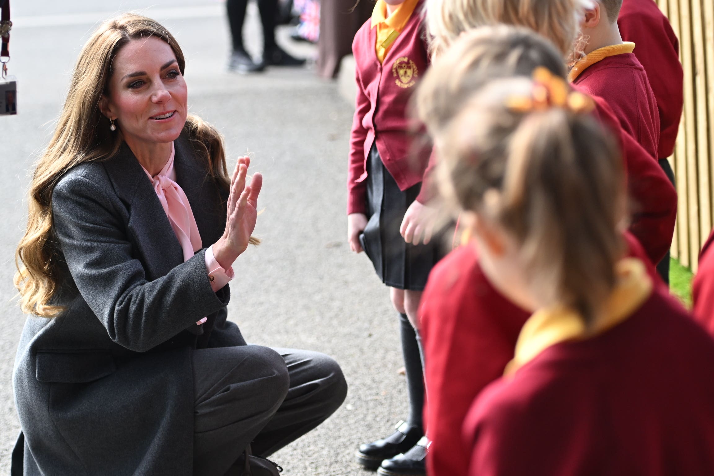 The Princess of Wales speaks to pupils at Farnborough Road Infant and Junior School in Birkdale, Southport (Eddie Mulholland/Daily Telegraph/PA)