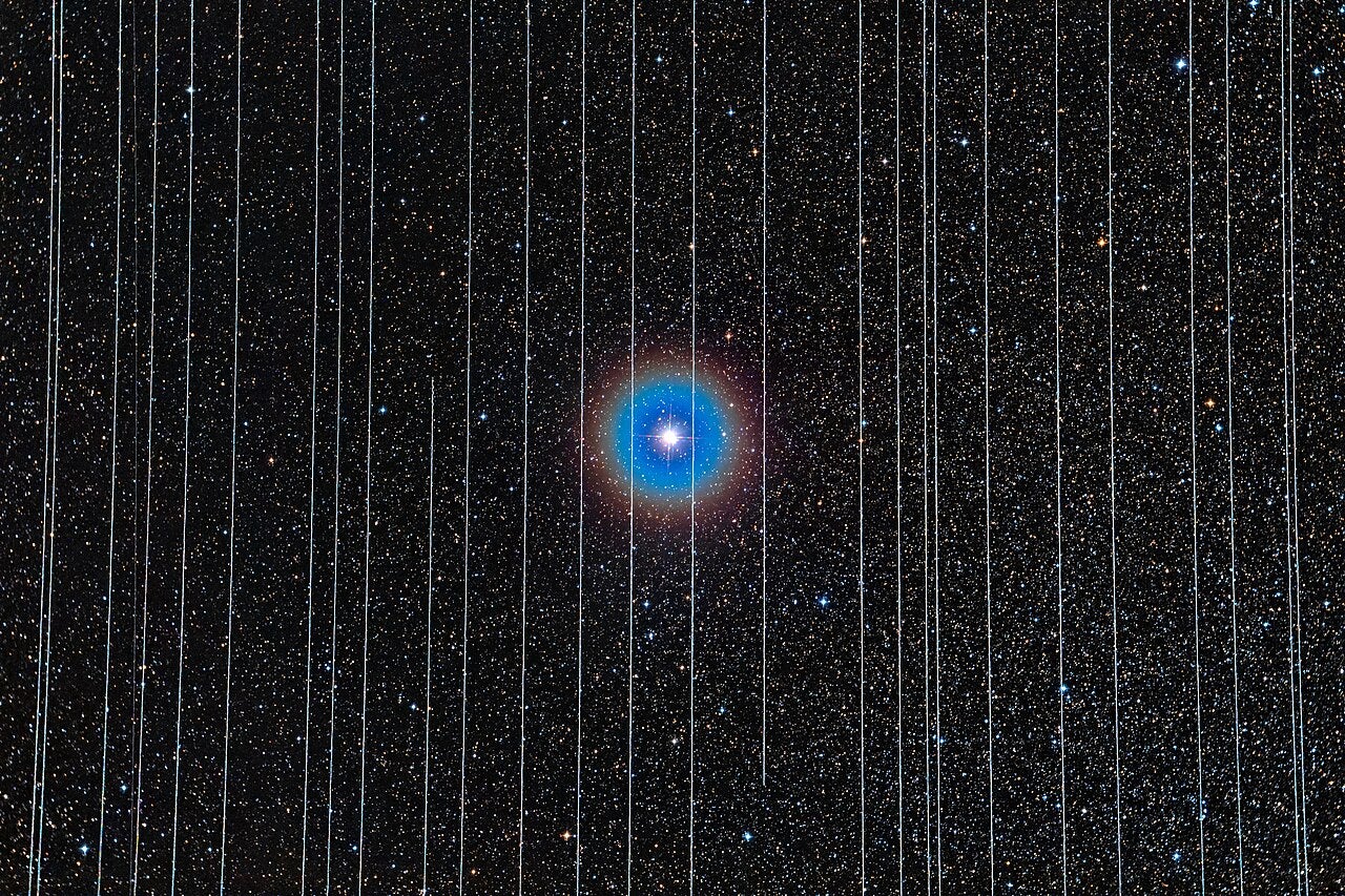 The double star Albireo in Cygnus captured on 26 December 2019. The 2.5-minute exposures recorded Starlink satellites moving across the field