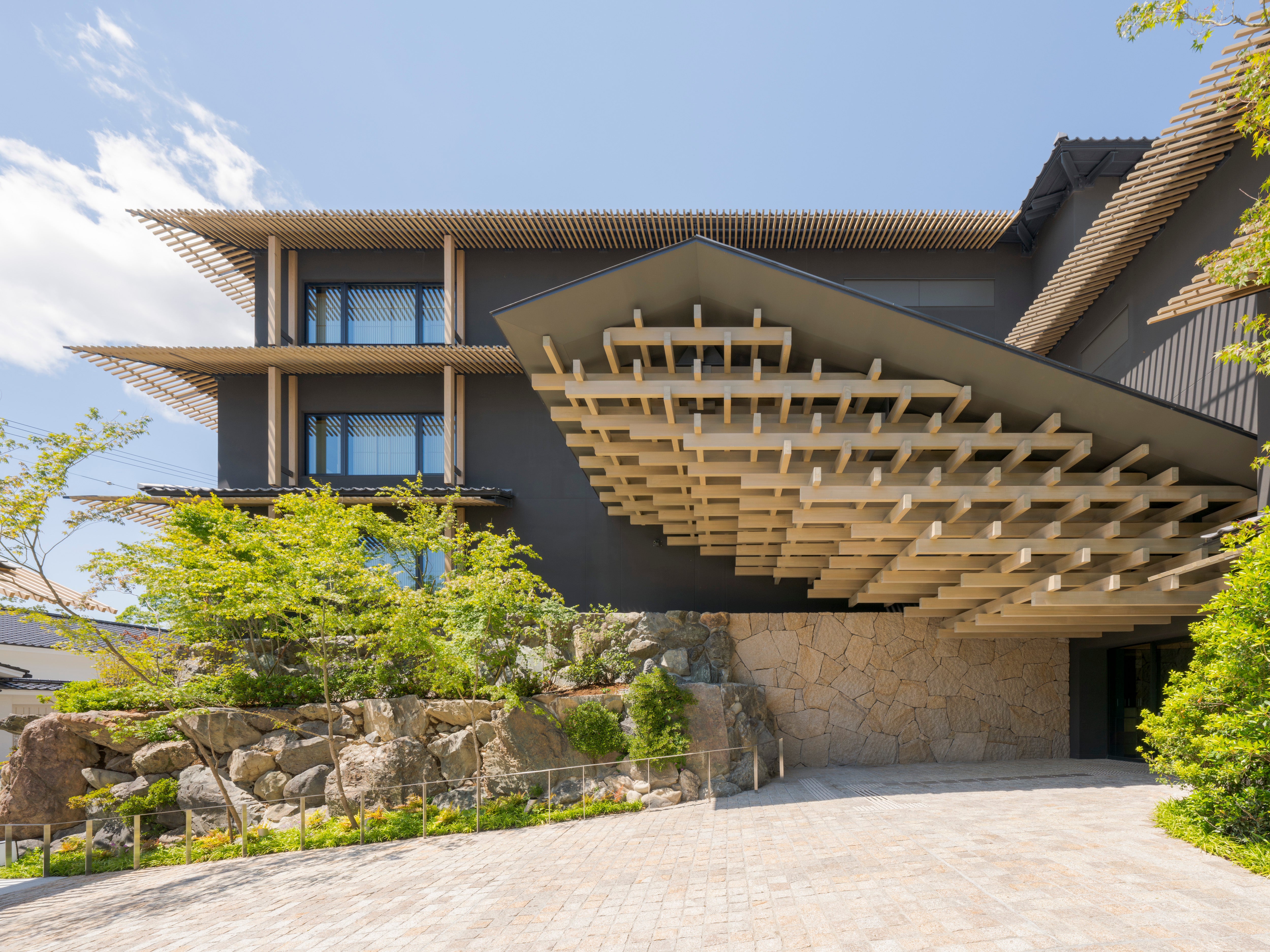 <p>Bayan Tree is built up the hillside among a lush forest overlooking temples</p>