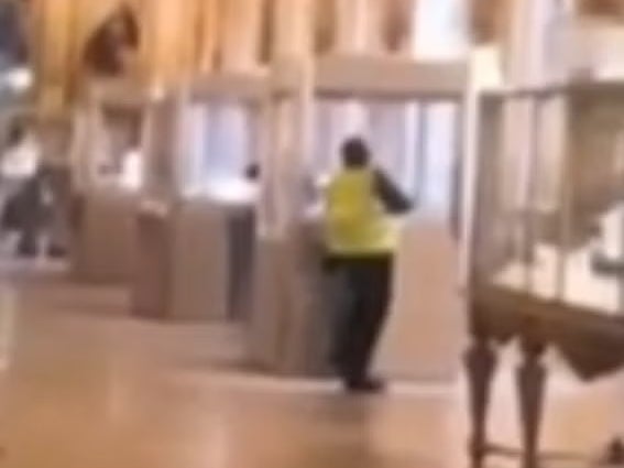 A visitor films the moment the jewellery was taken