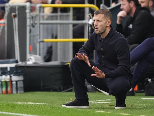 <p>Jack Wilshere on the touchline in his first game as manager for Luton Town</p>